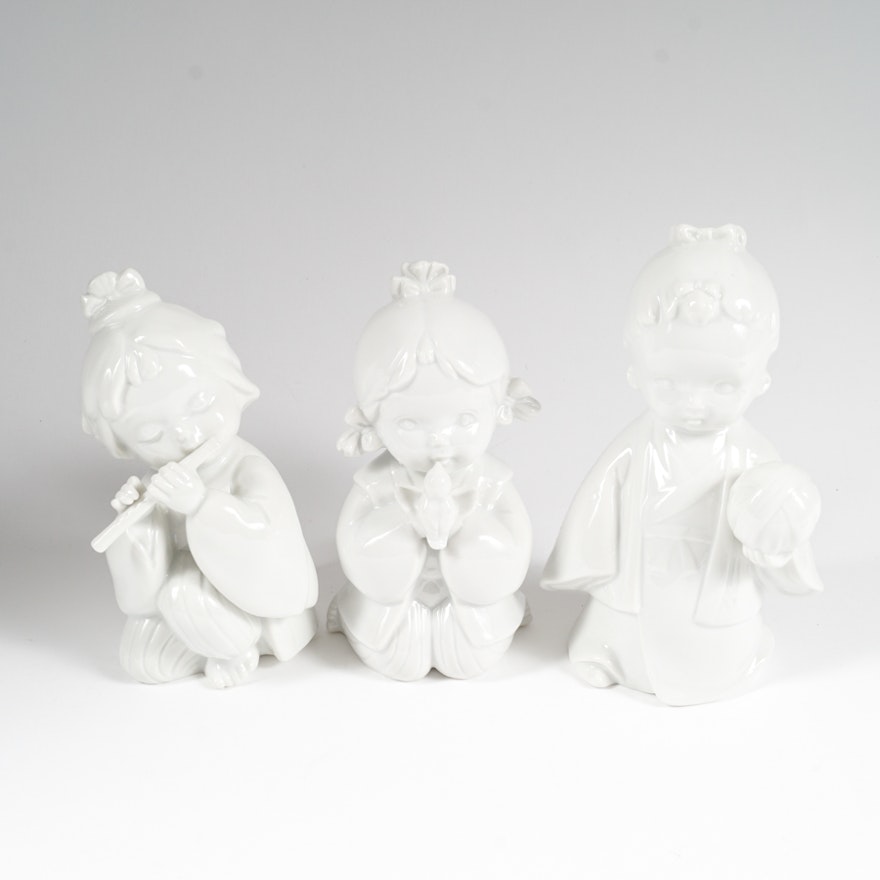 Set of White Porcelain Figurines of Children