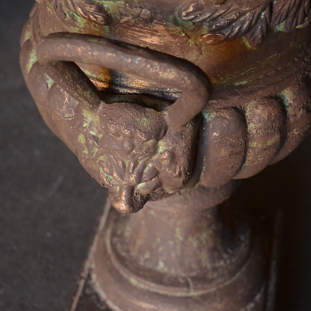 Pair of Ornate Cast Iron Urns
