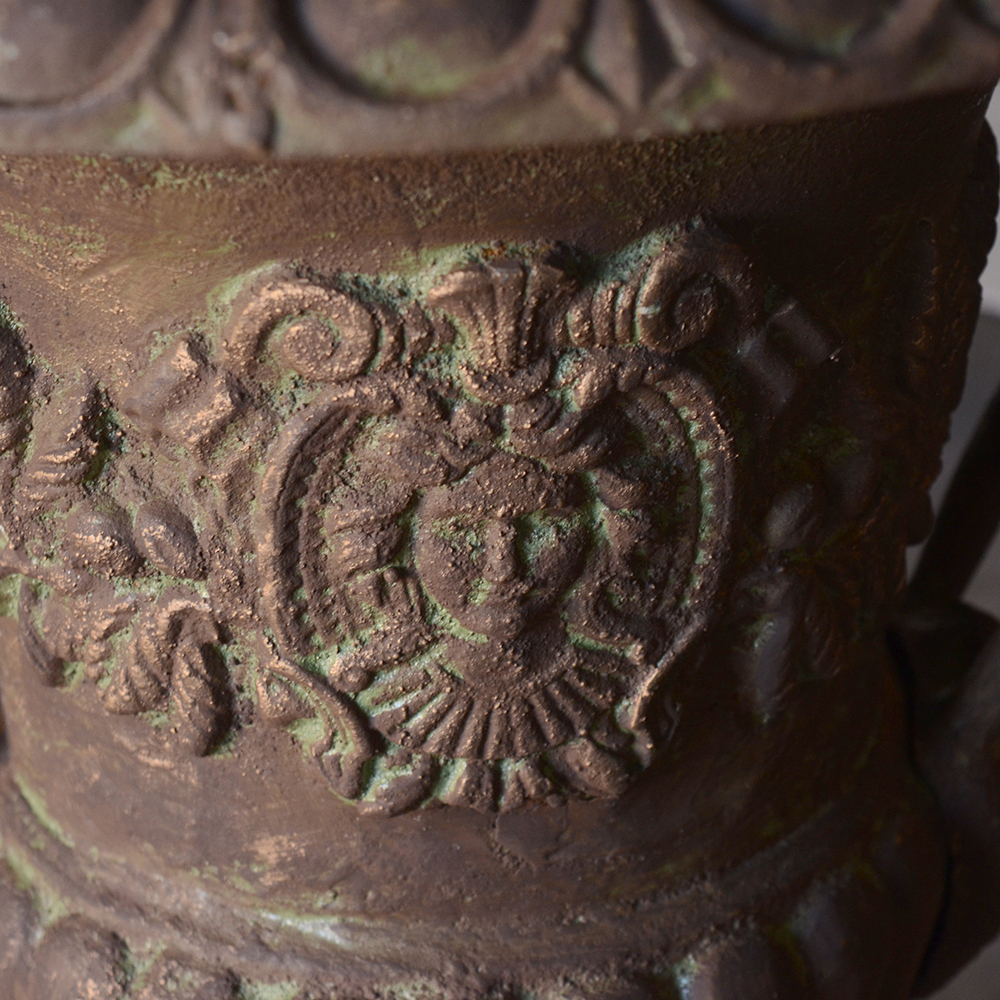 Pair of Ornate Cast Iron Urns