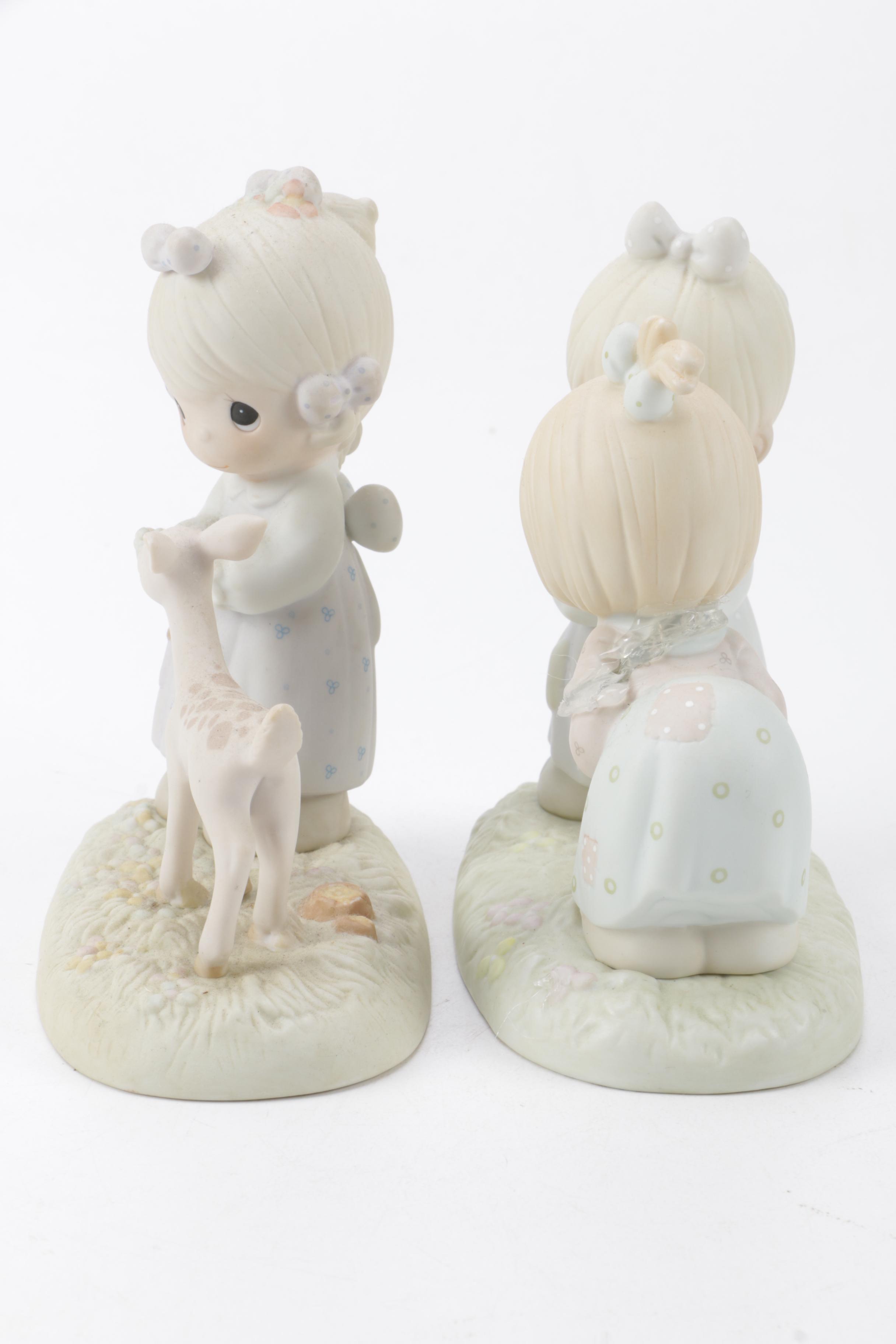 A Collection of Precious Moments Figurines