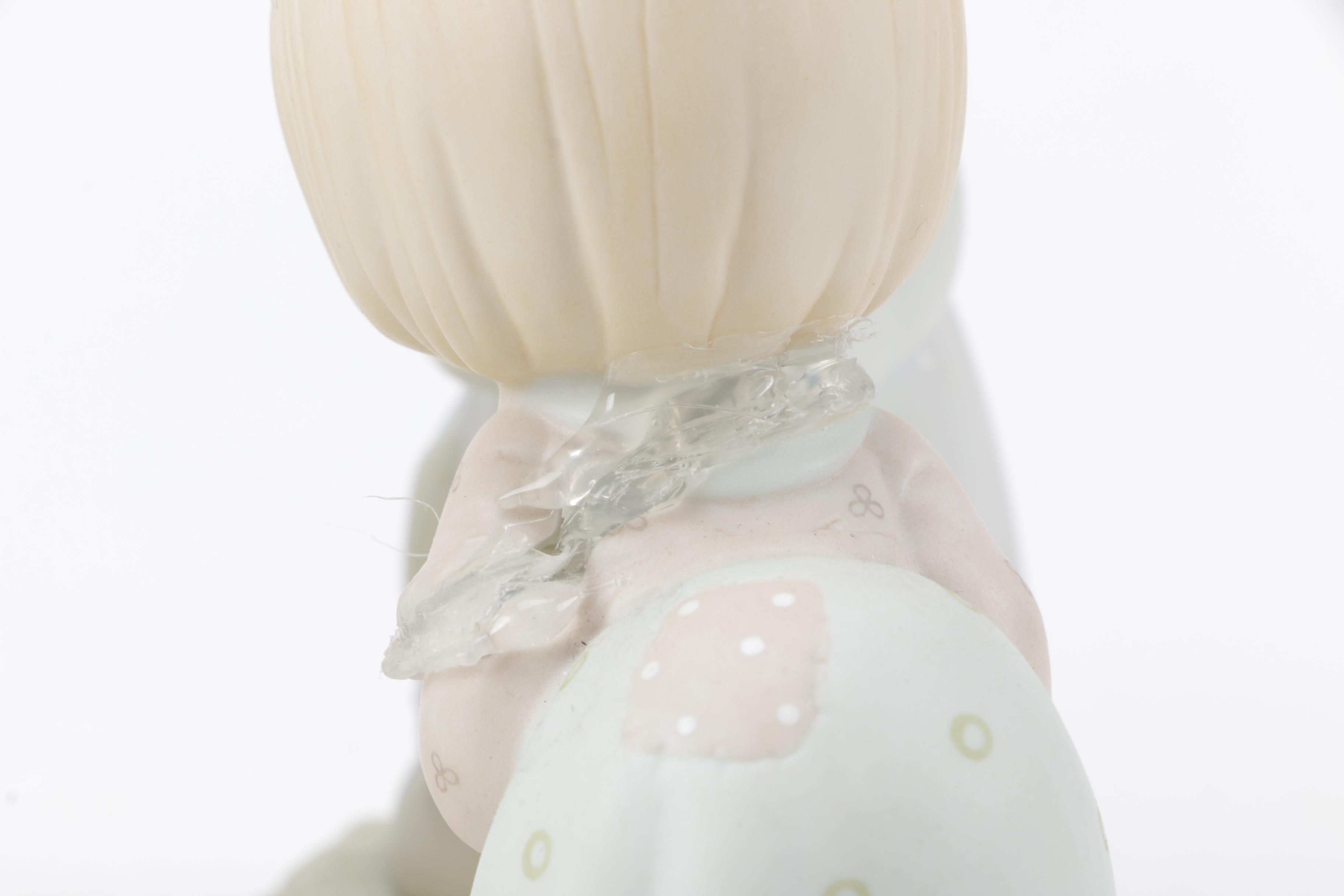 A Collection of Precious Moments Figurines