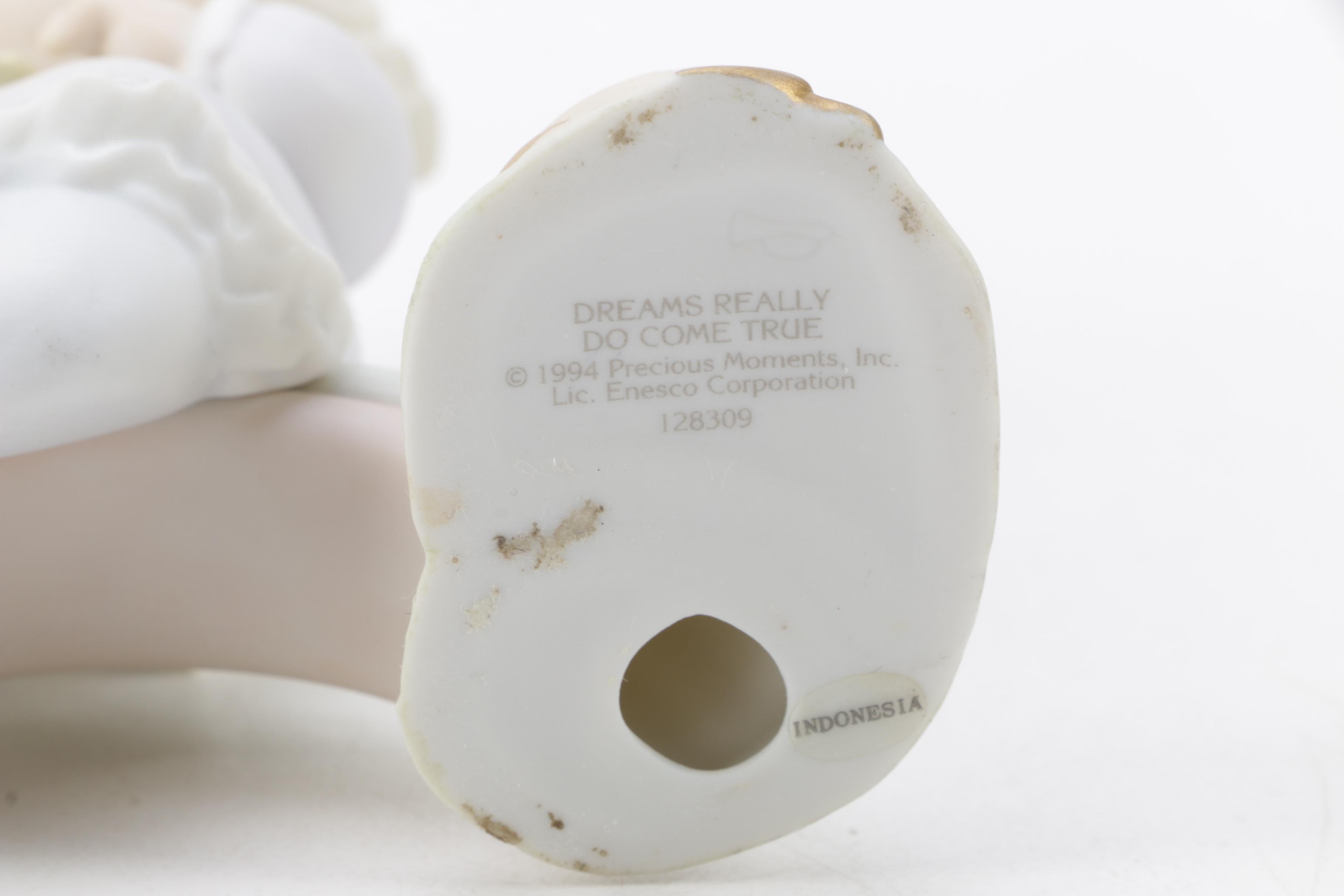 A Collection of Precious Moments Figurines