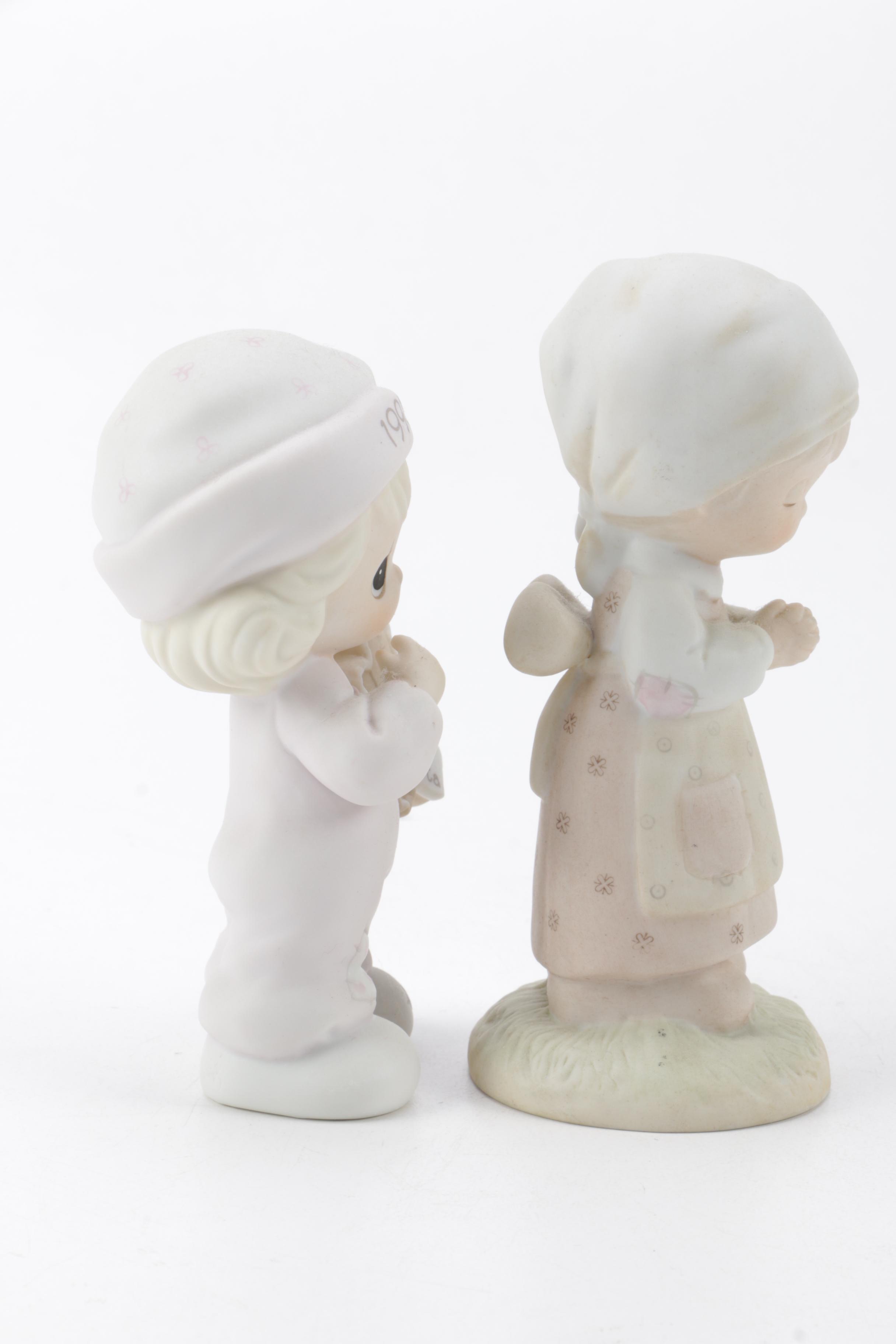A Collection of Precious Moments Figurines