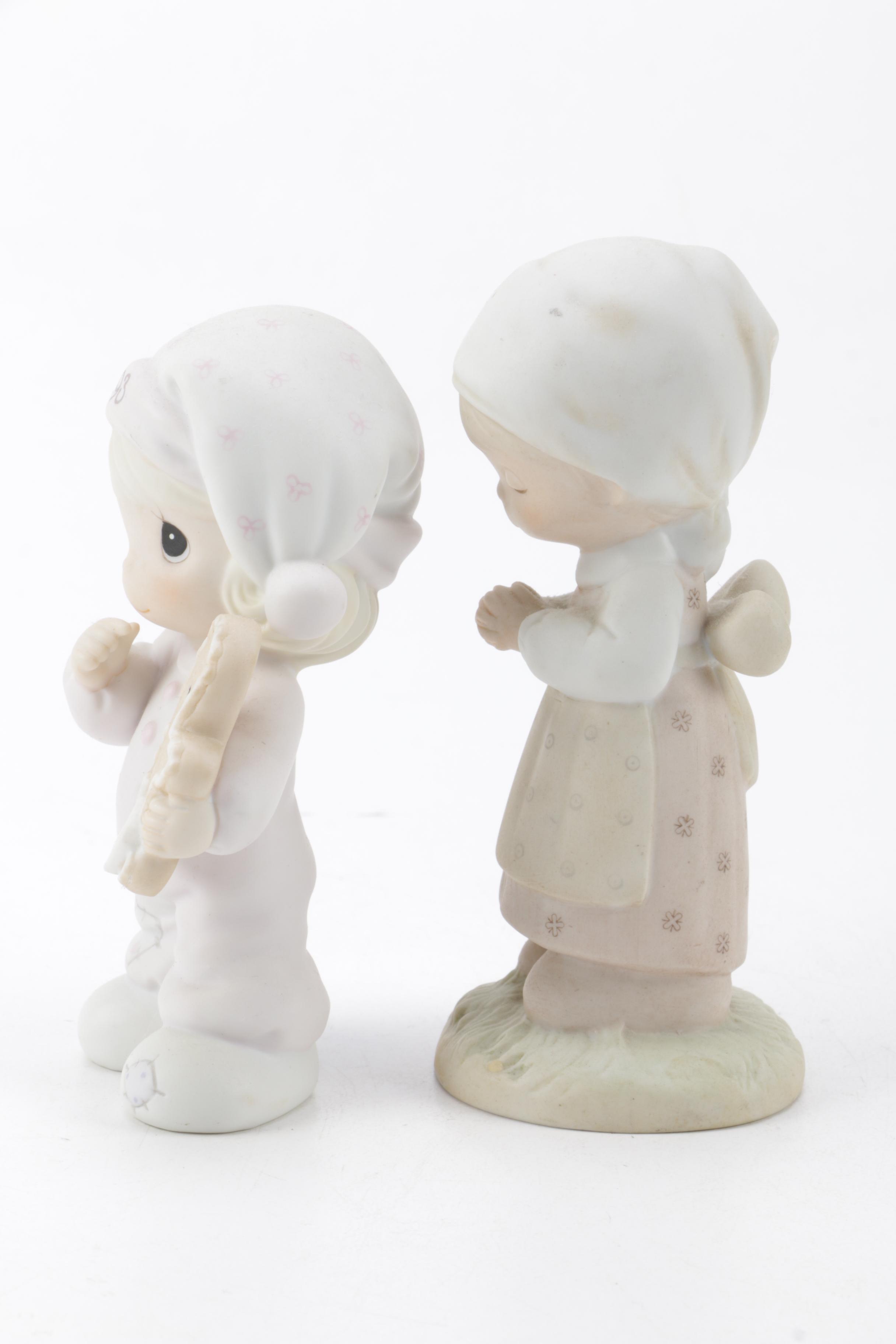 A Collection of Precious Moments Figurines