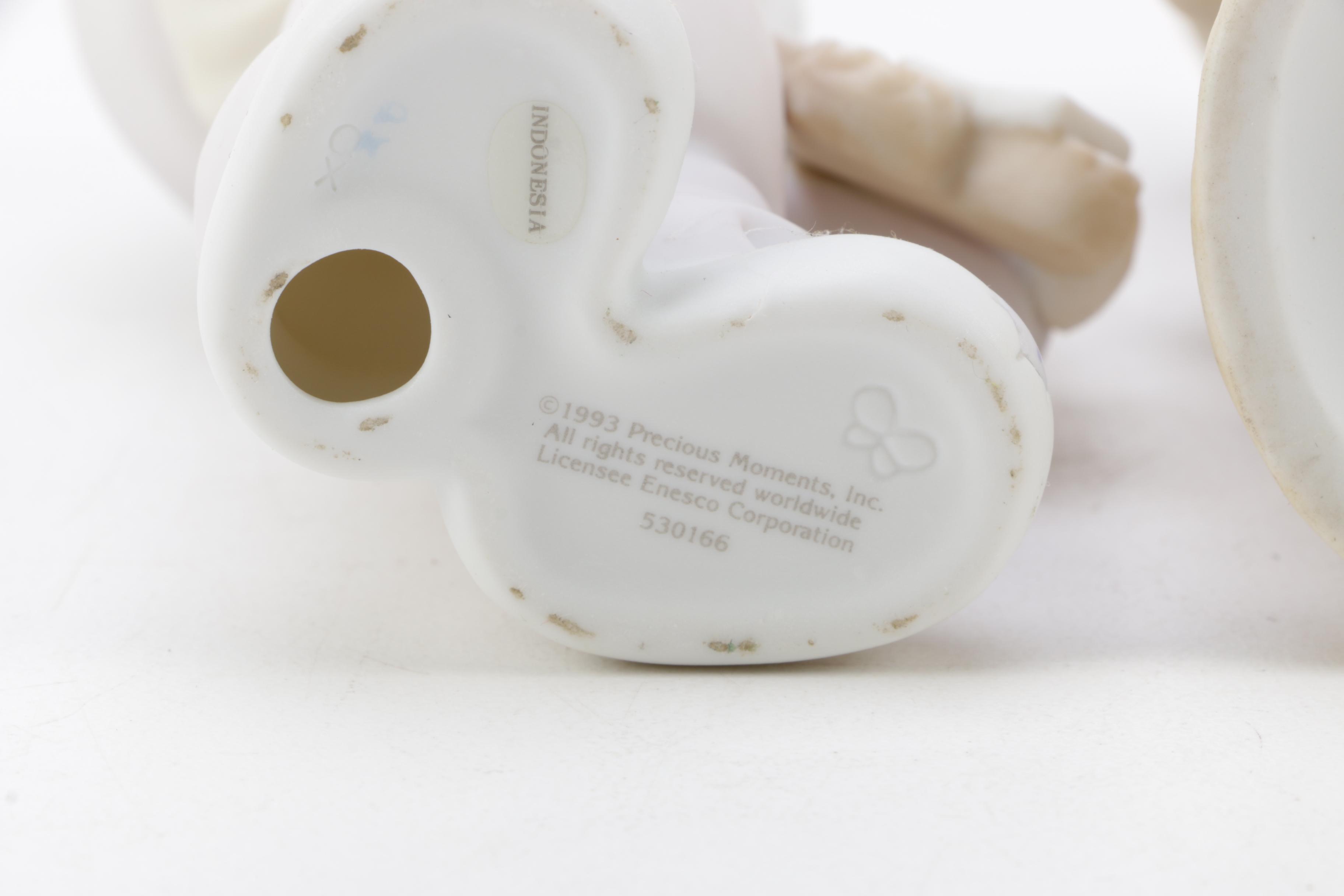 A Collection of Precious Moments Figurines