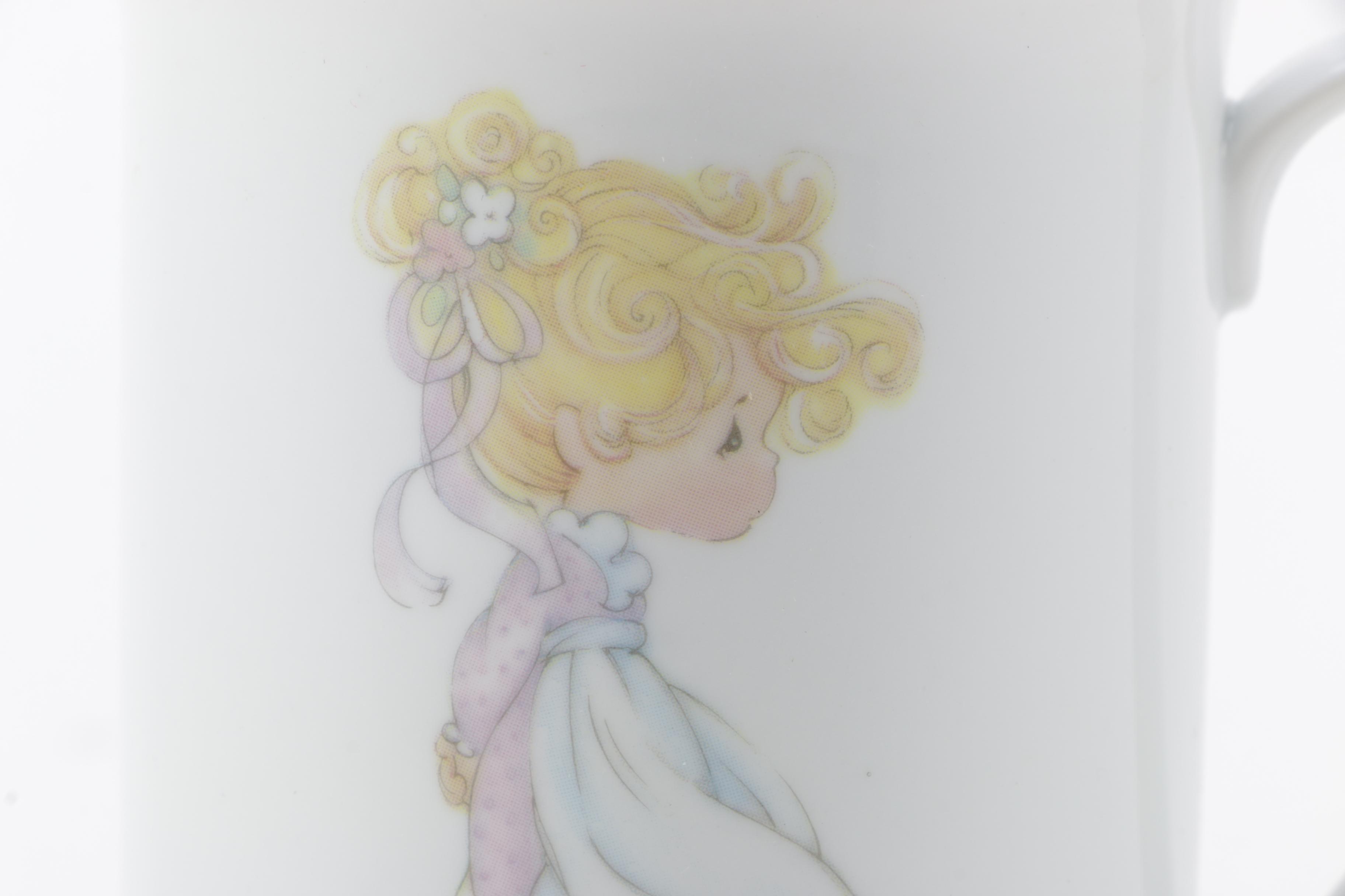 A Collection of Precious Moments Figurines