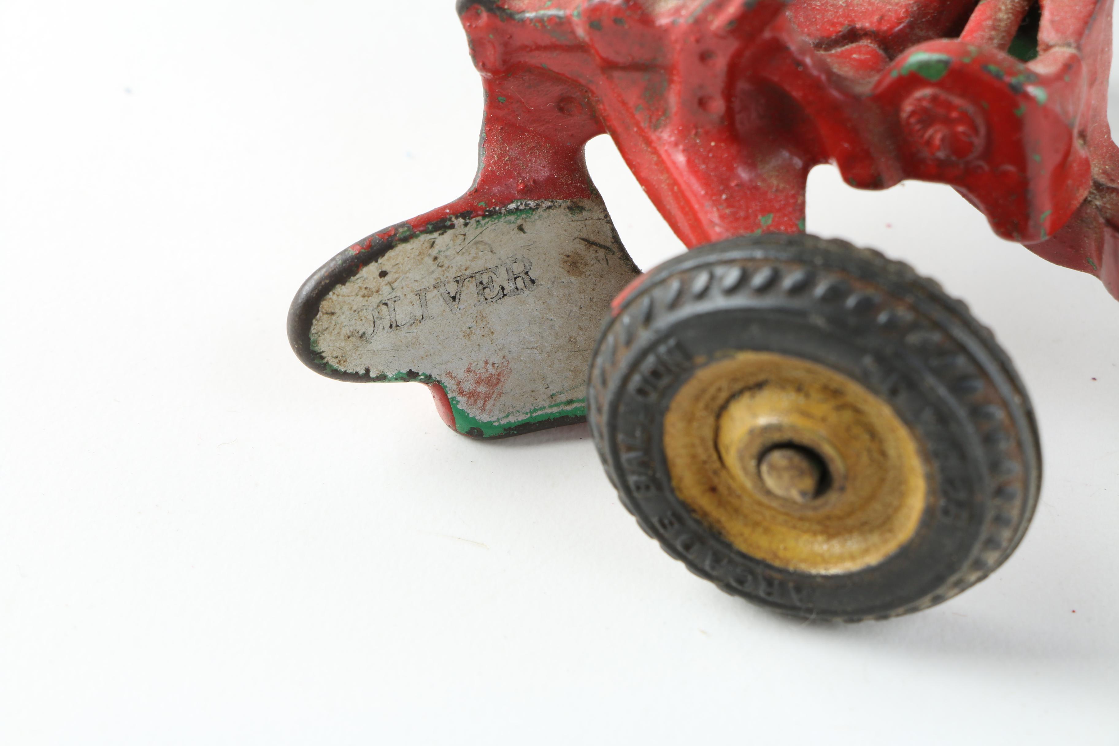 1930s Arcade Cast iron Oliver Tractor with Accessories
