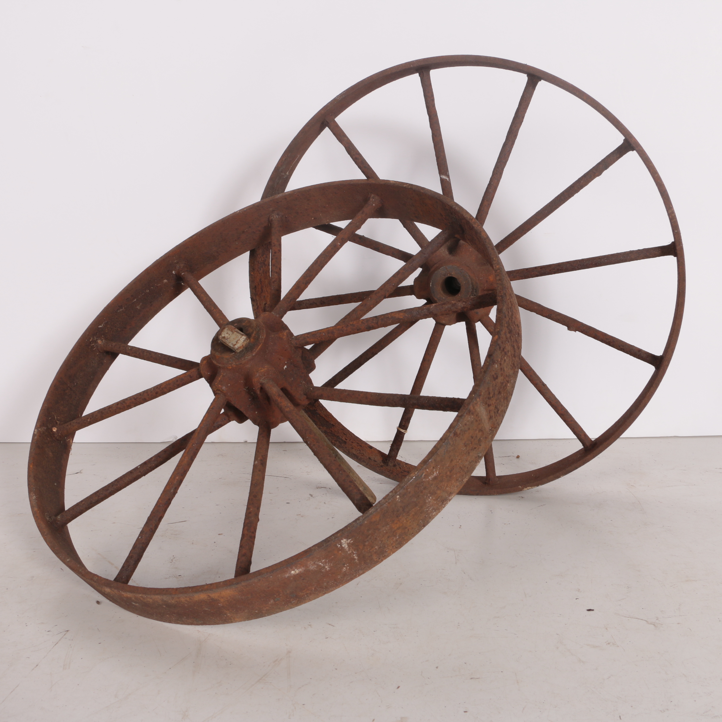 Two Decorative Metal Wagon Wheels