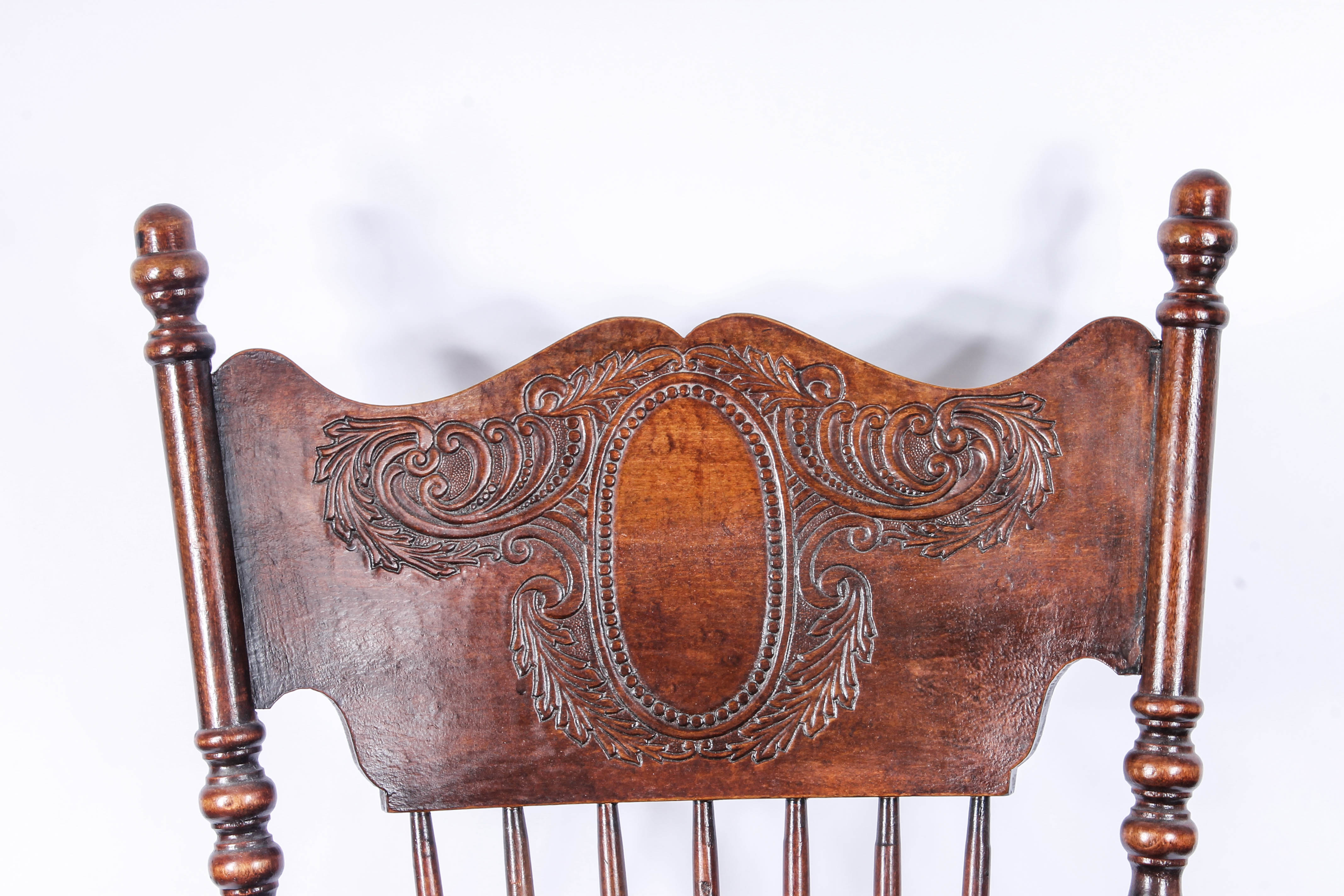Antique Pressed Back Rocking Chair with Leather Seat