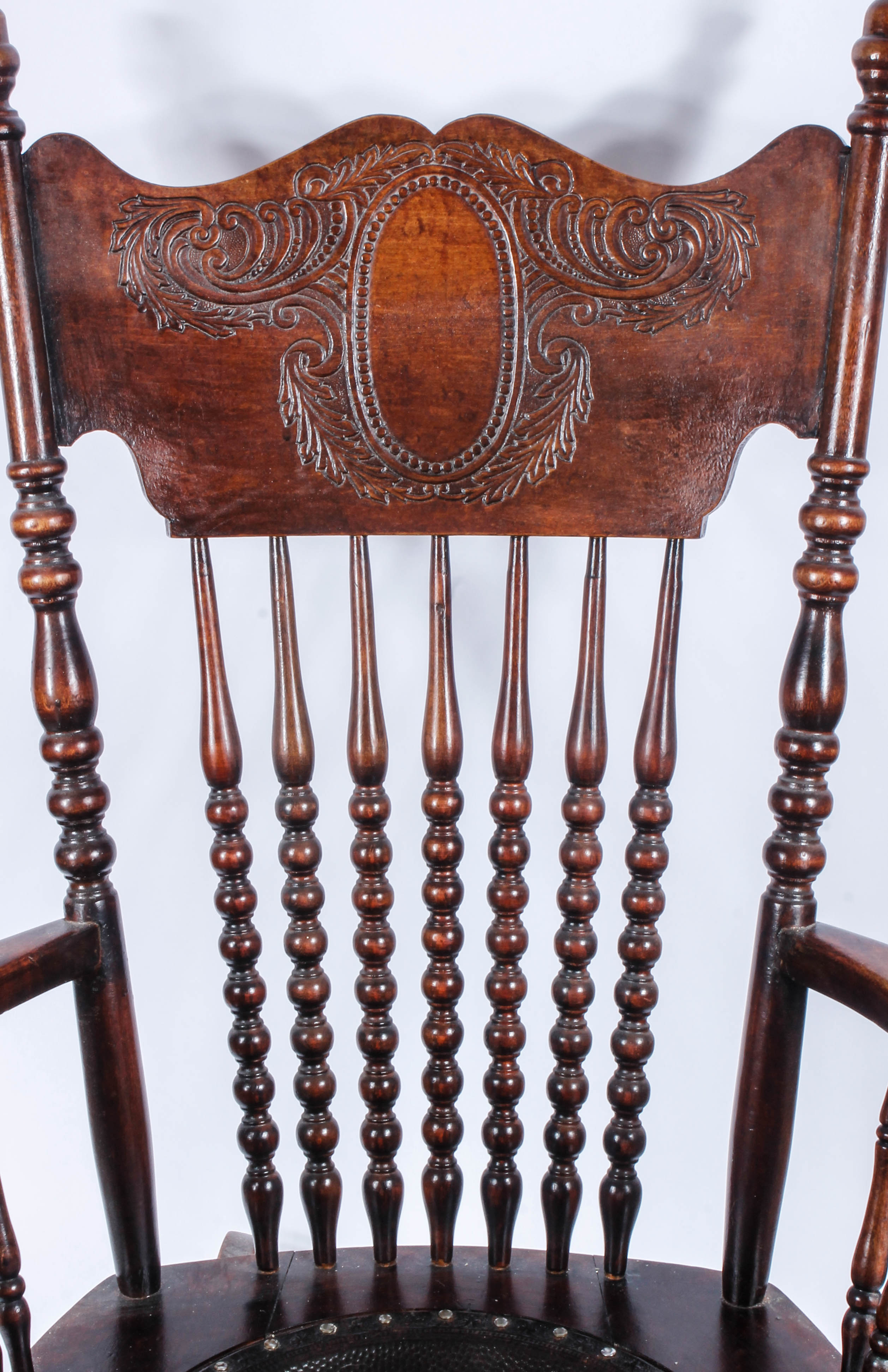 Antique Pressed Back Rocking Chair with Leather Seat