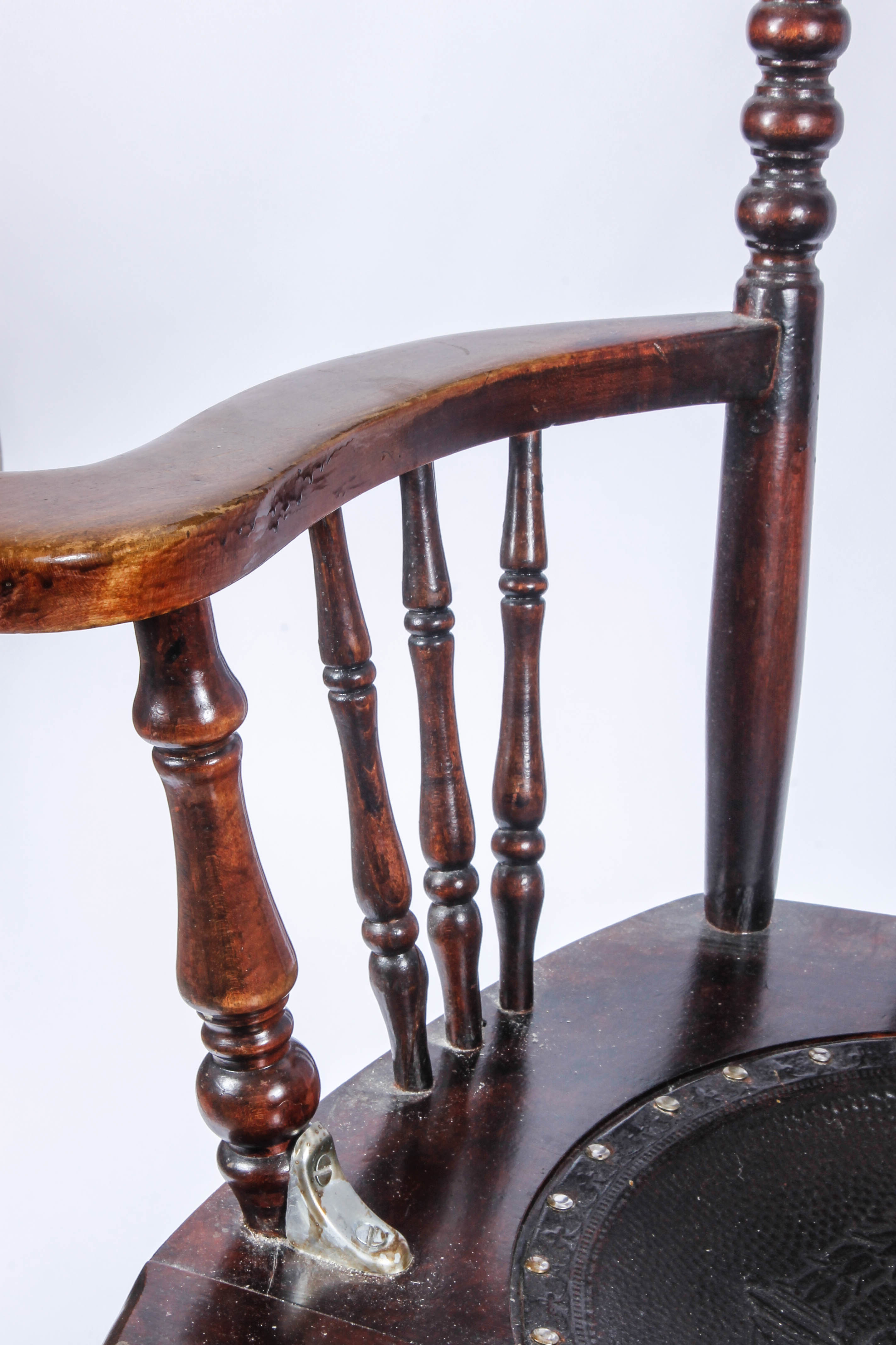 Antique Pressed Back Rocking Chair with Leather Seat