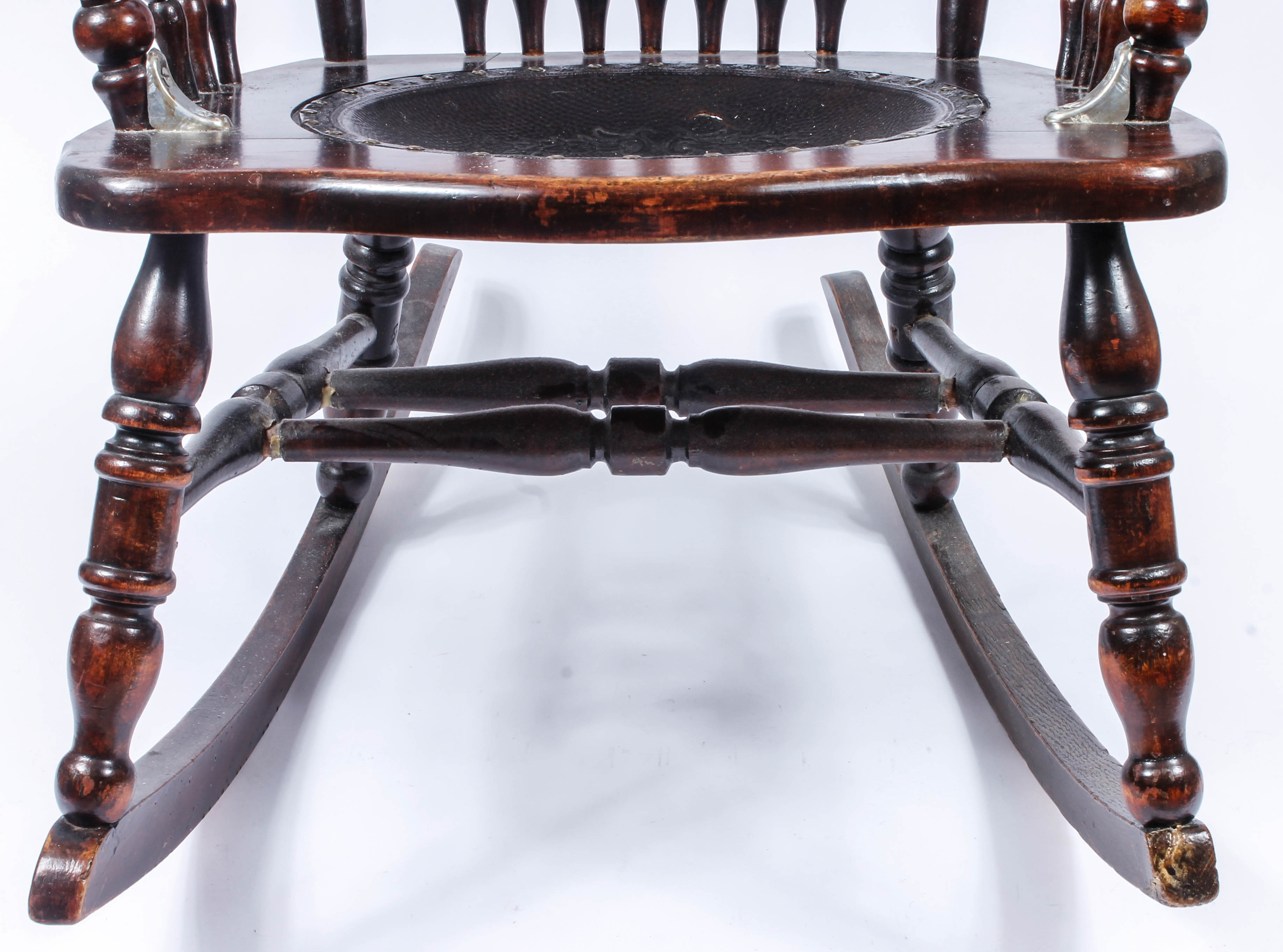 Antique Pressed Back Rocking Chair with Leather Seat