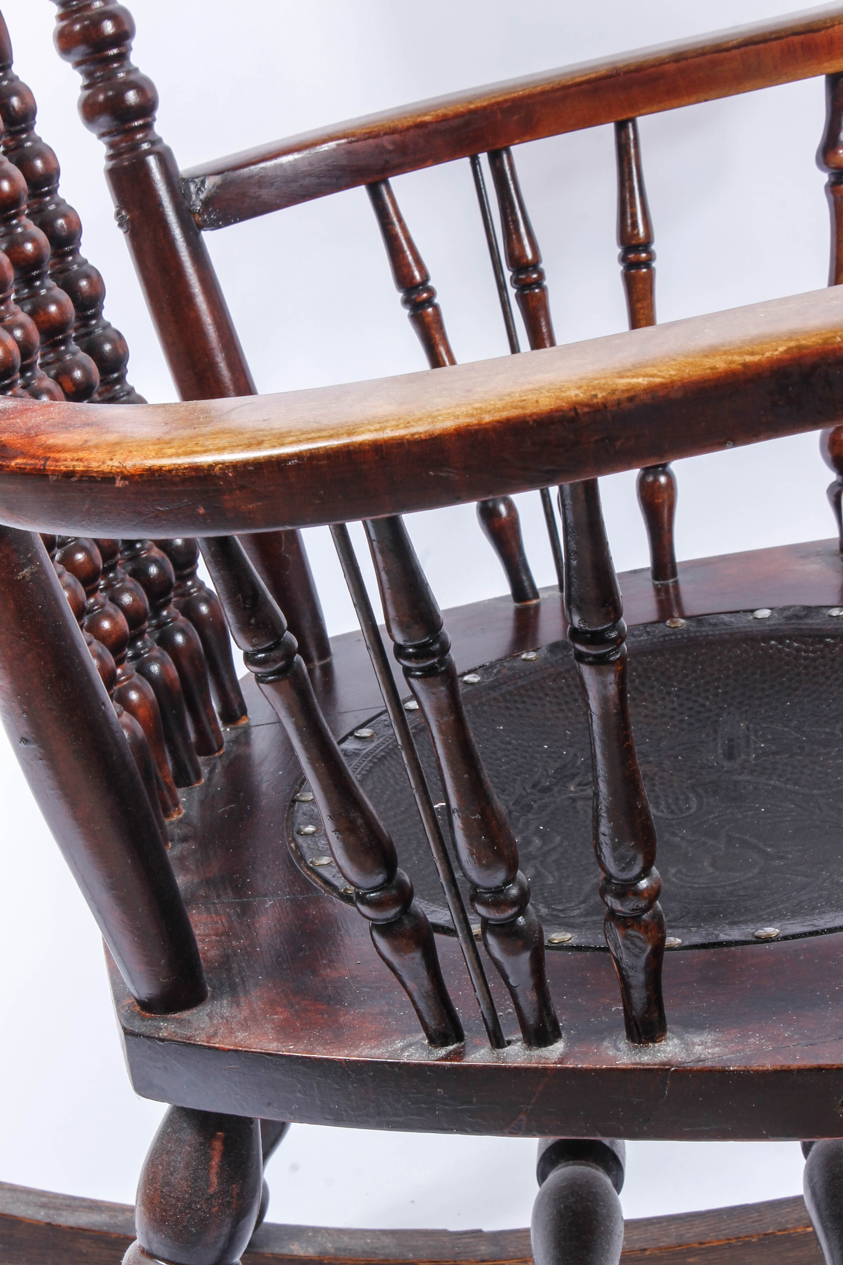 Antique Pressed Back Rocking Chair with Leather Seat