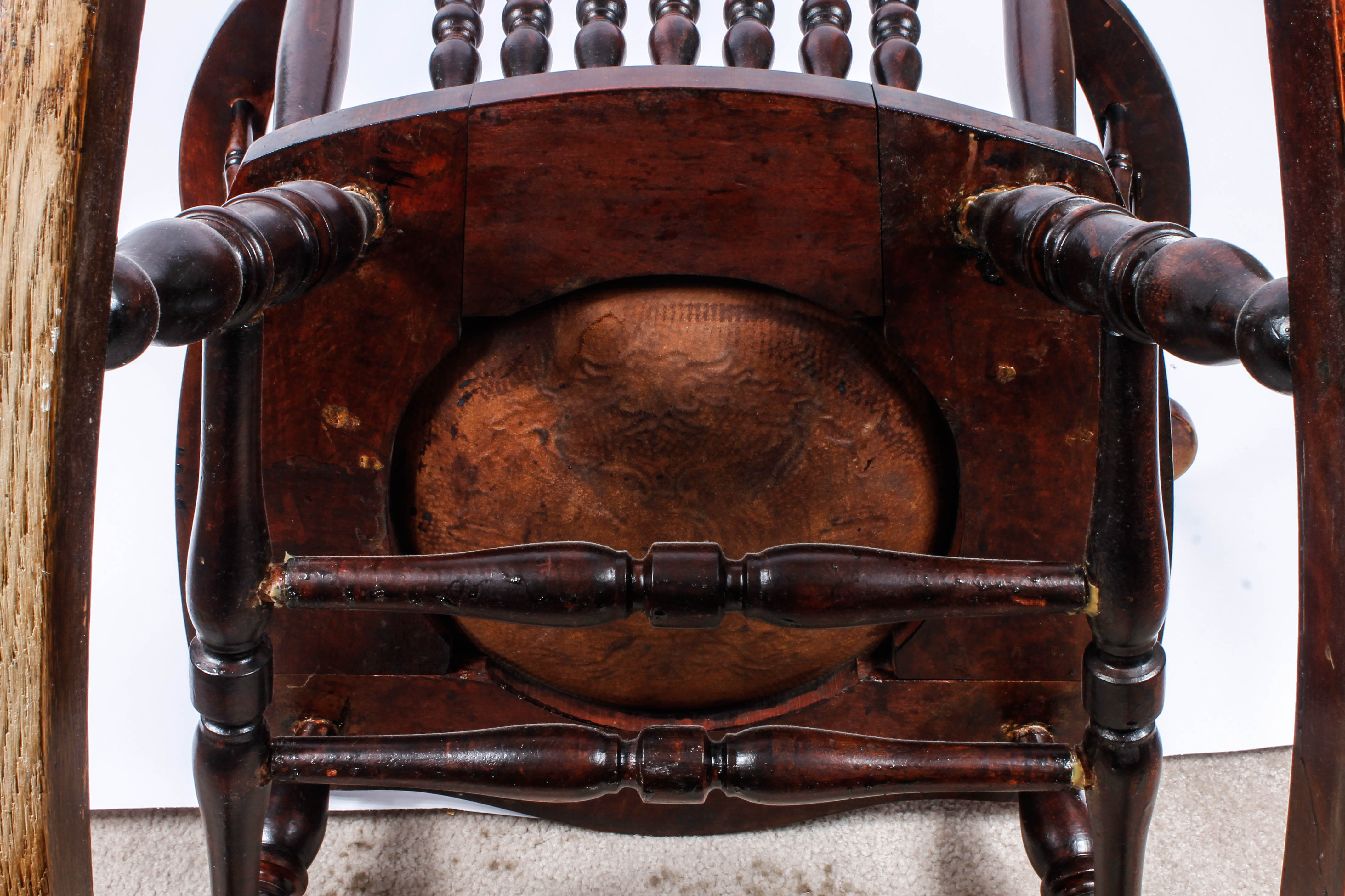 Antique Pressed Back Rocking Chair with Leather Seat
