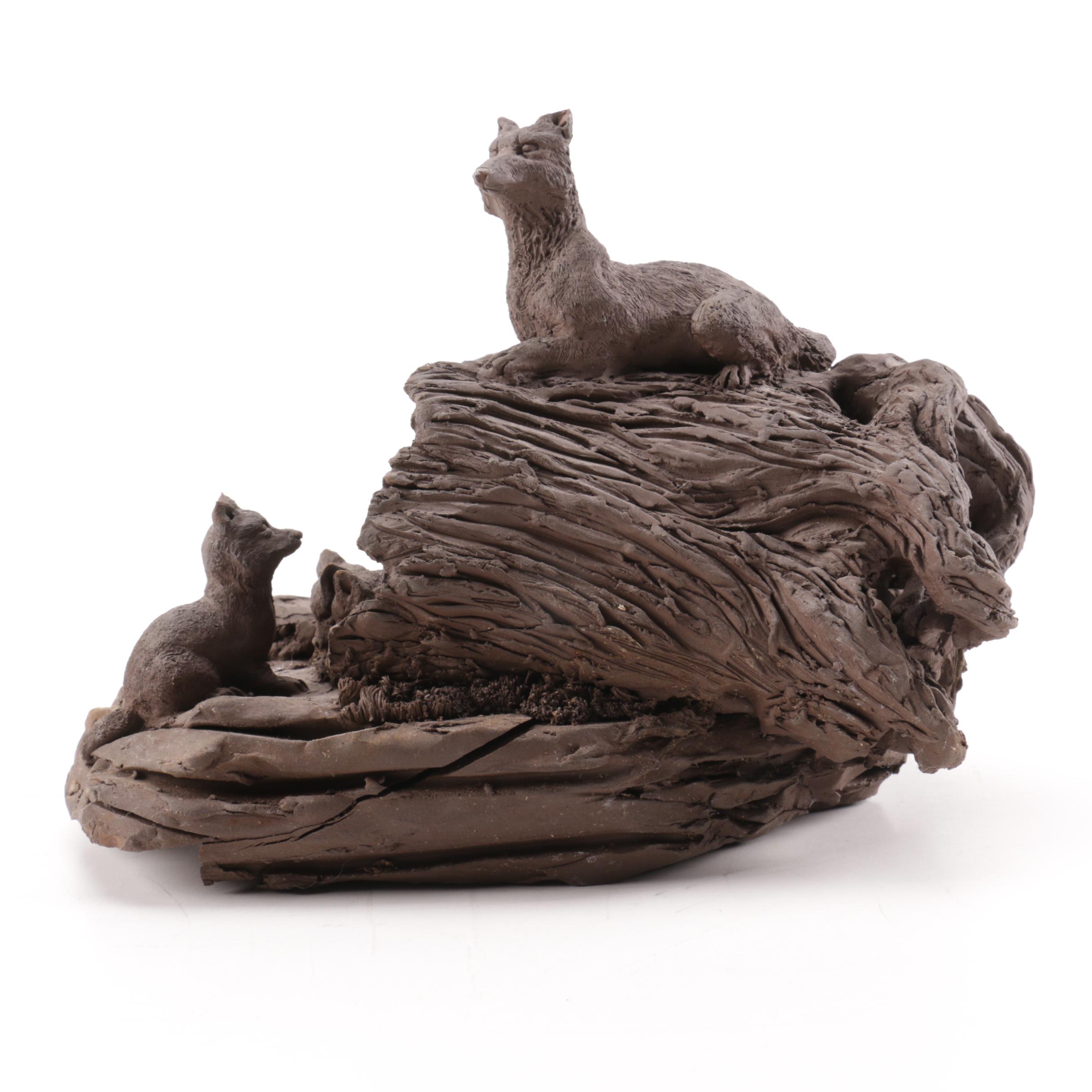 Metal Figurine of a Fox Den