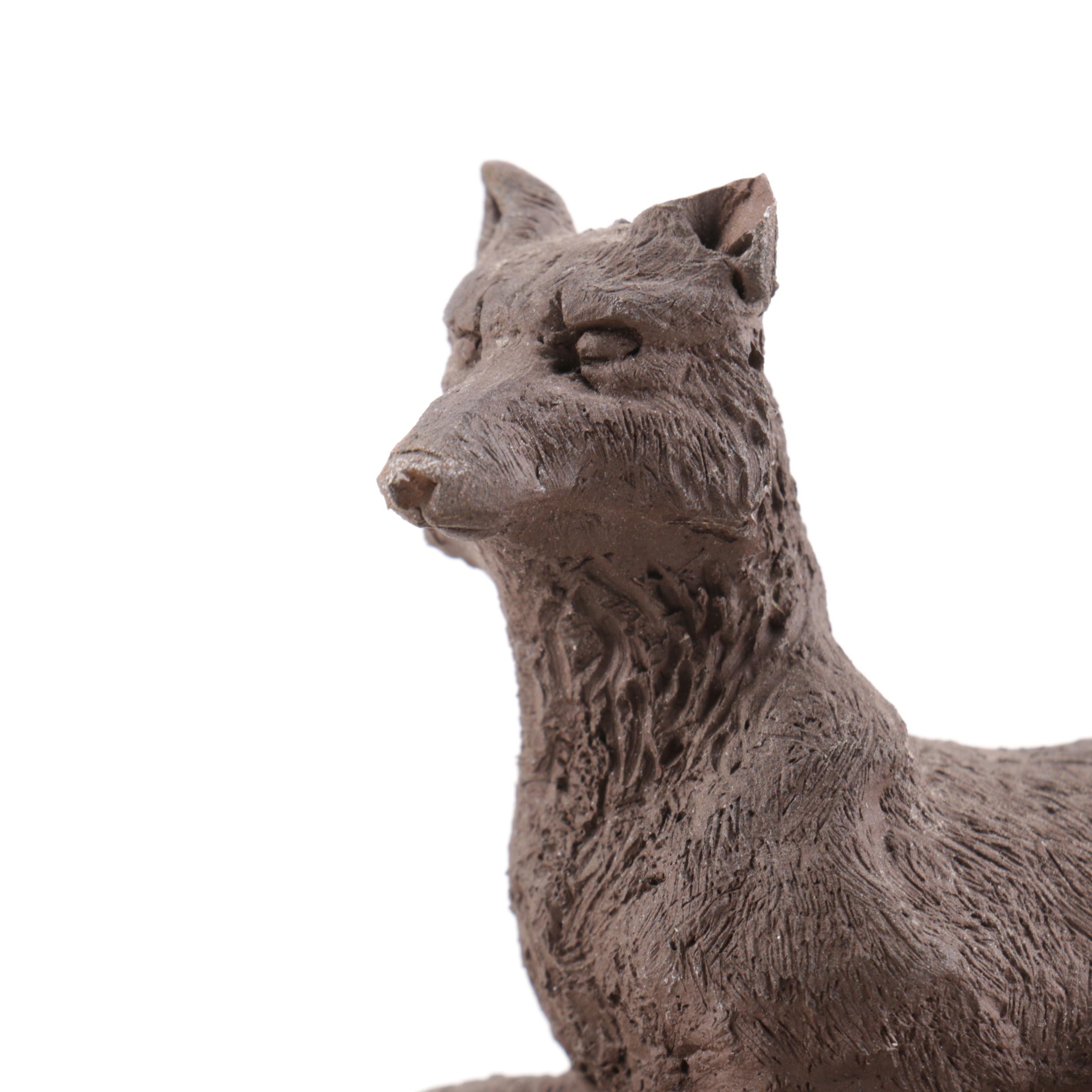 Metal Figurine of a Fox Den