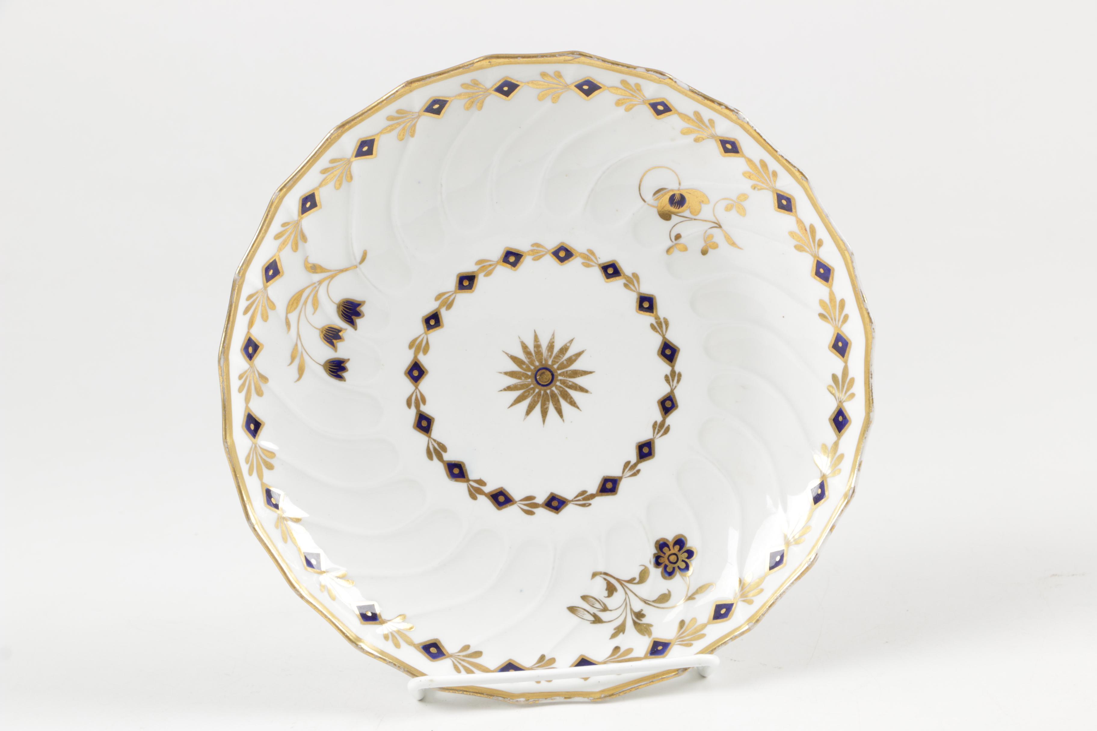Eclectic  English Tableware Featuring Antique Rockingham Works and Worchester