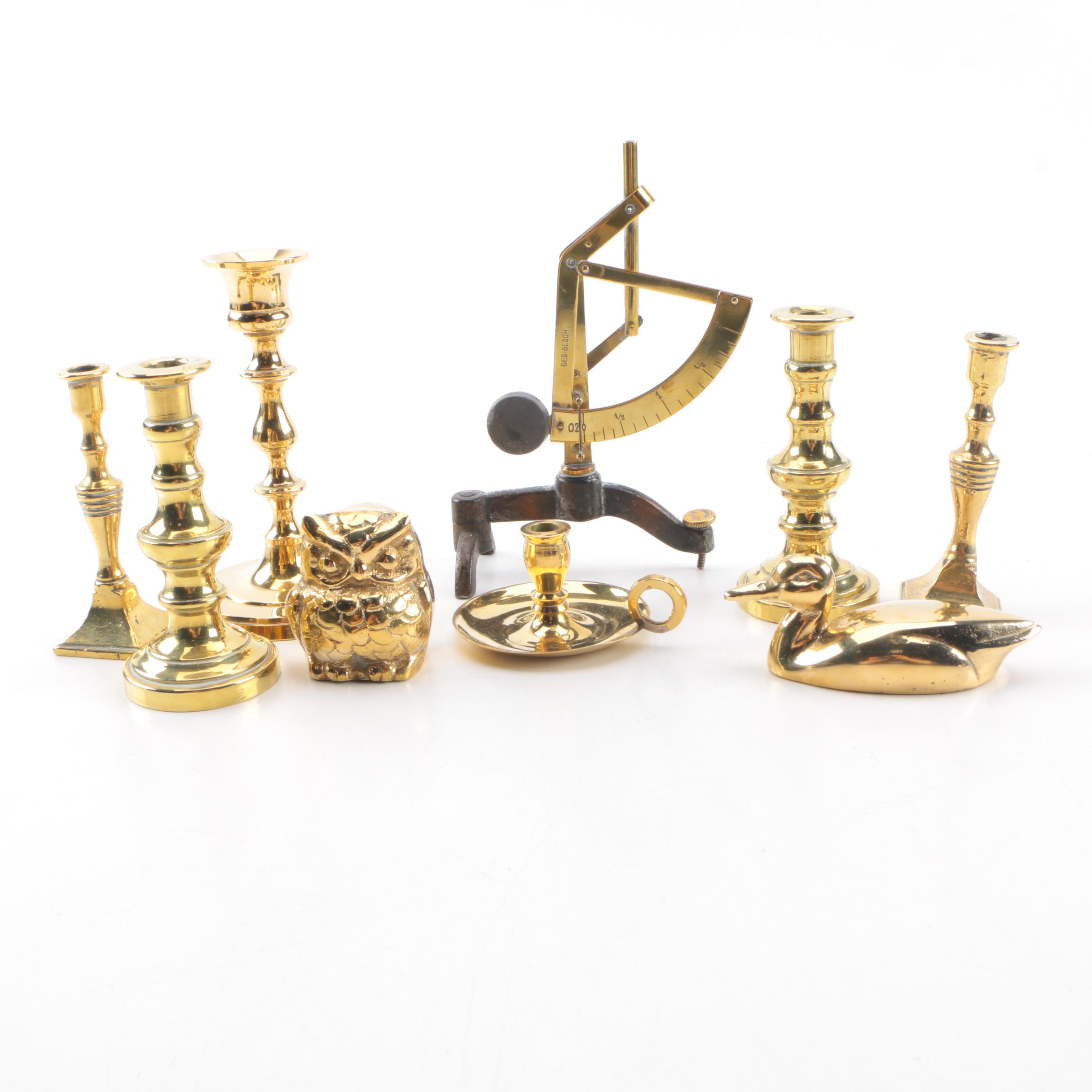 An Assortment of Brass Decorative items including Candlesticks