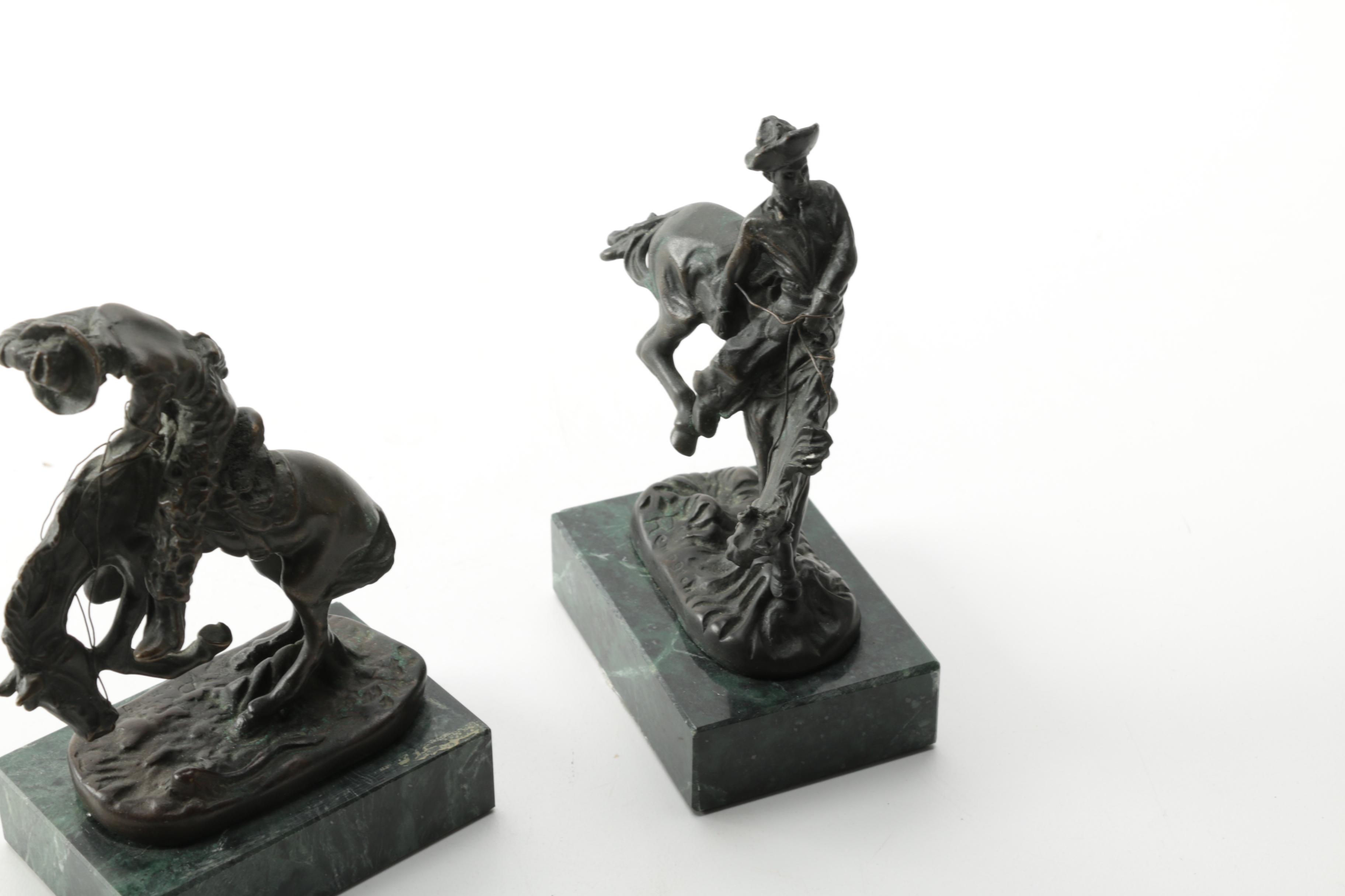 Pair of Frederic Remington Reproduction Metal Western Themed Sculptures