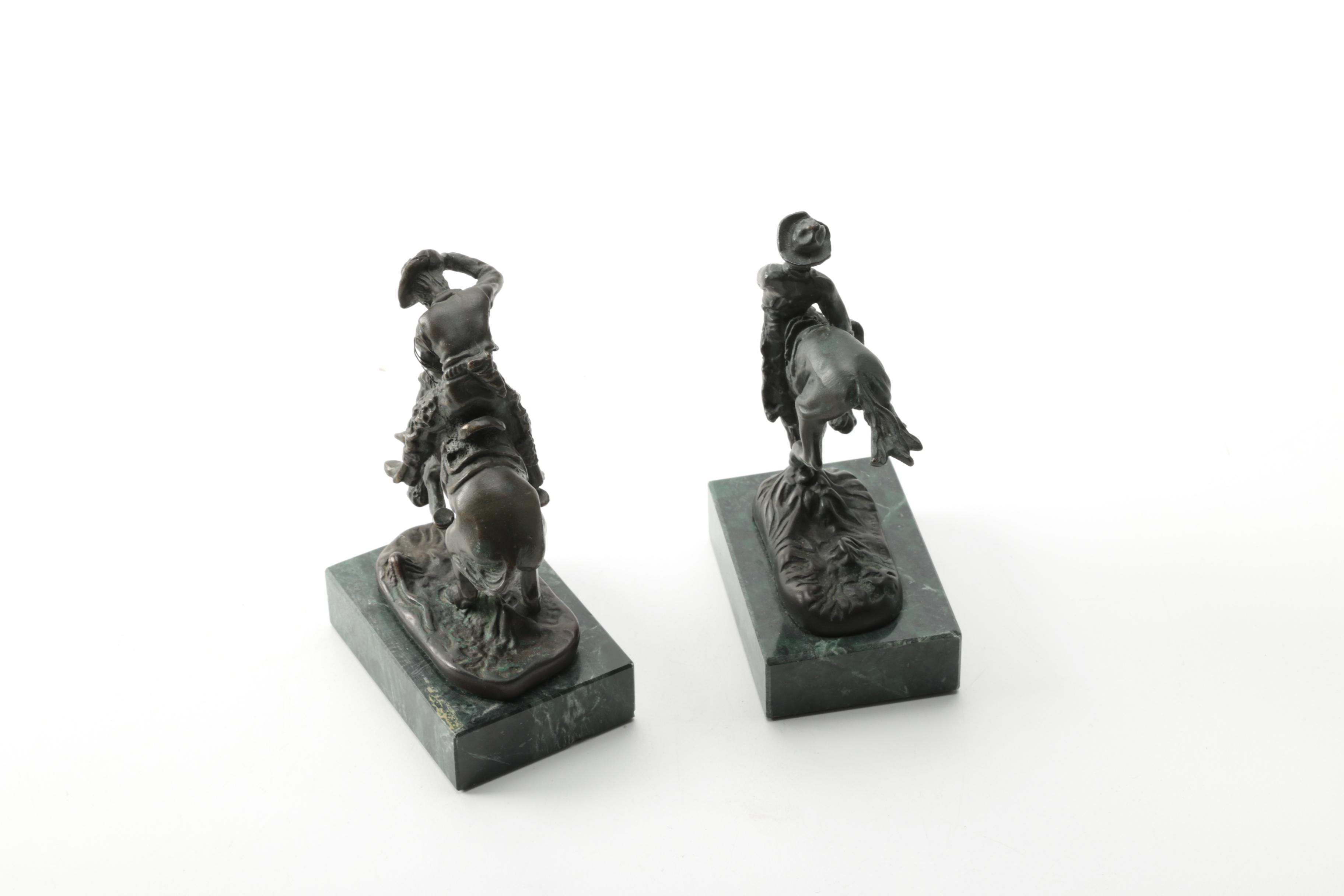Pair of Frederic Remington Reproduction Metal Western Themed Sculptures