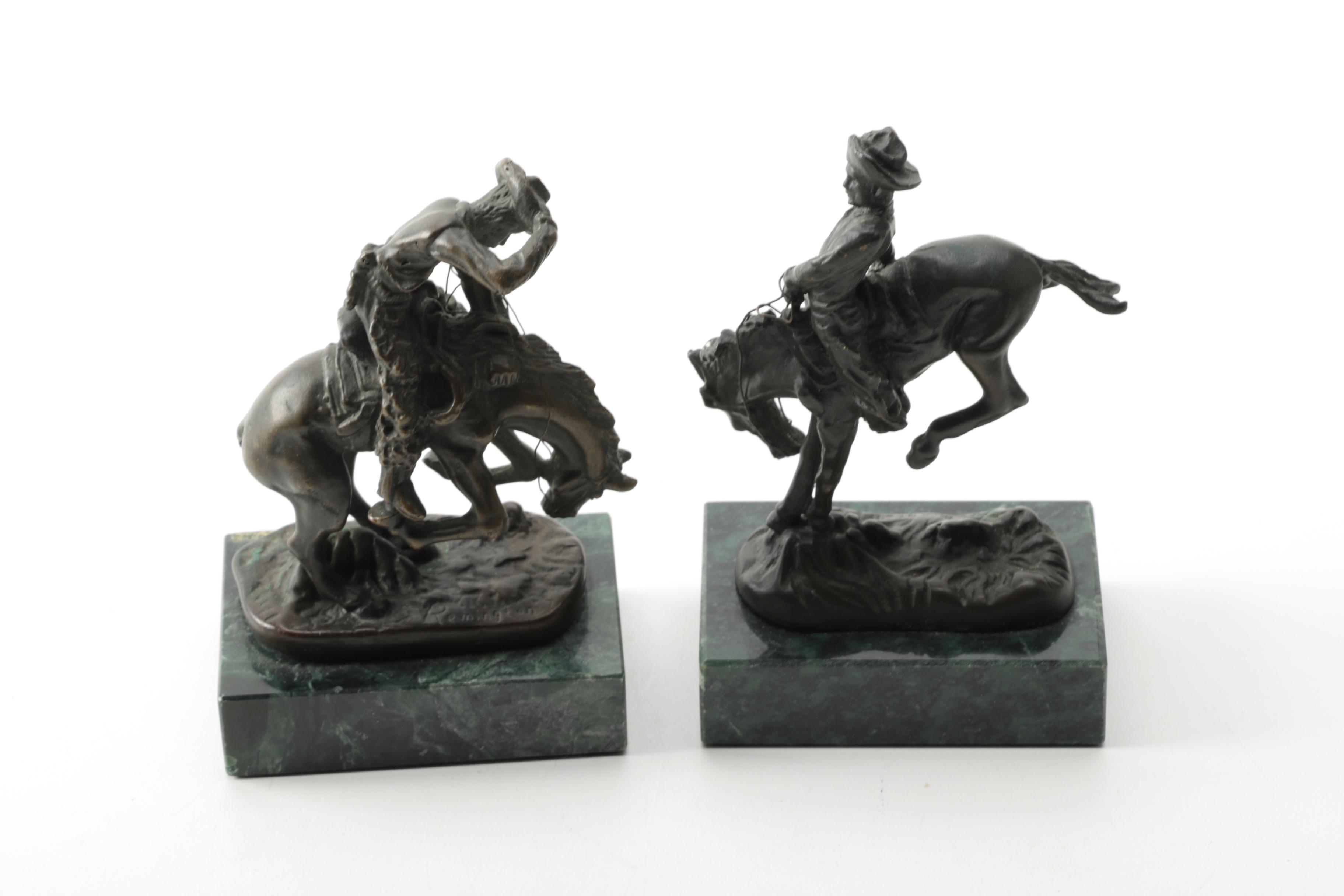Pair of Frederic Remington Reproduction Metal Western Themed Sculptures