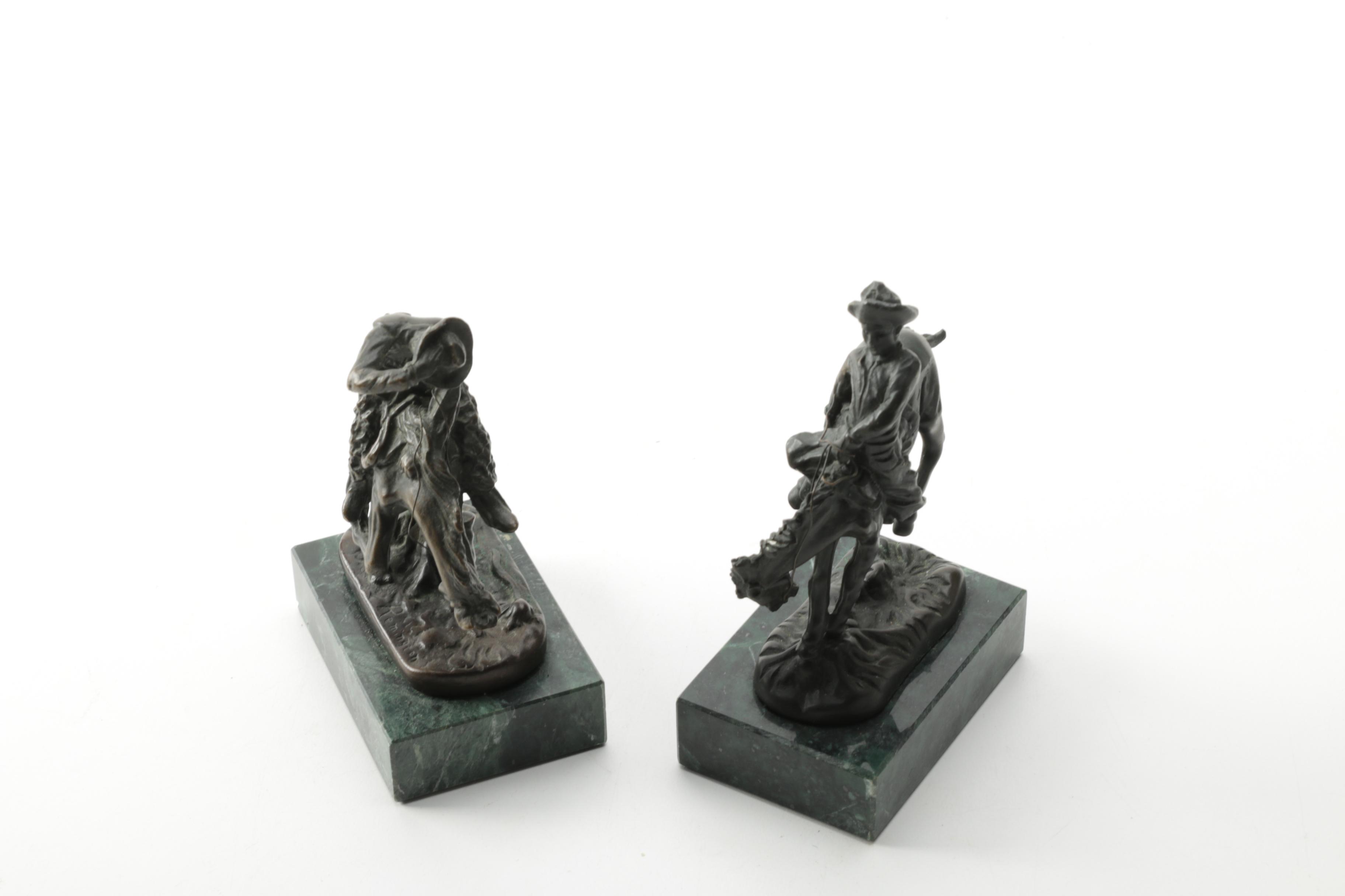Pair of Frederic Remington Reproduction Metal Western Themed Sculptures