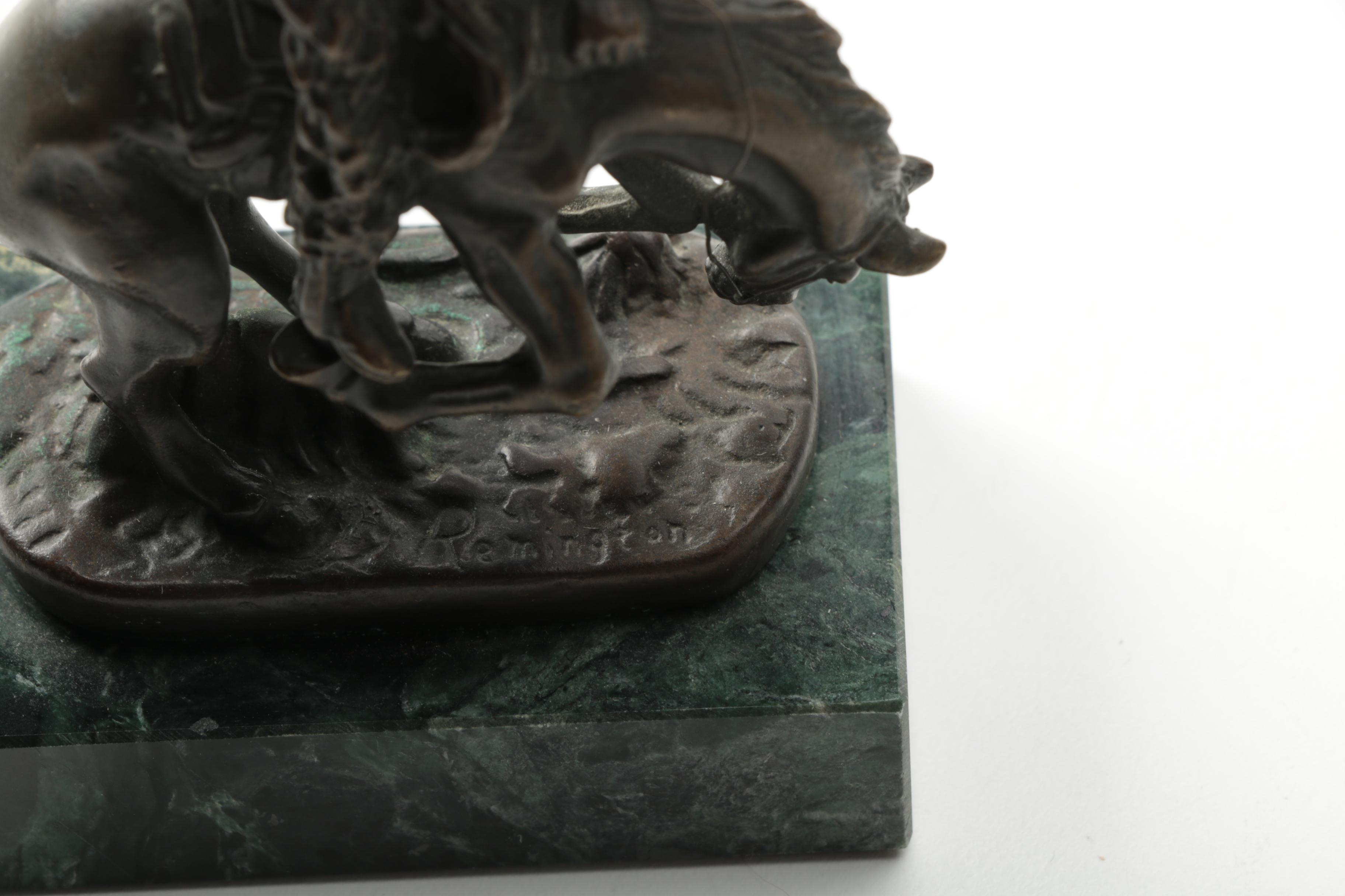 Pair of Frederic Remington Reproduction Metal Western Themed Sculptures