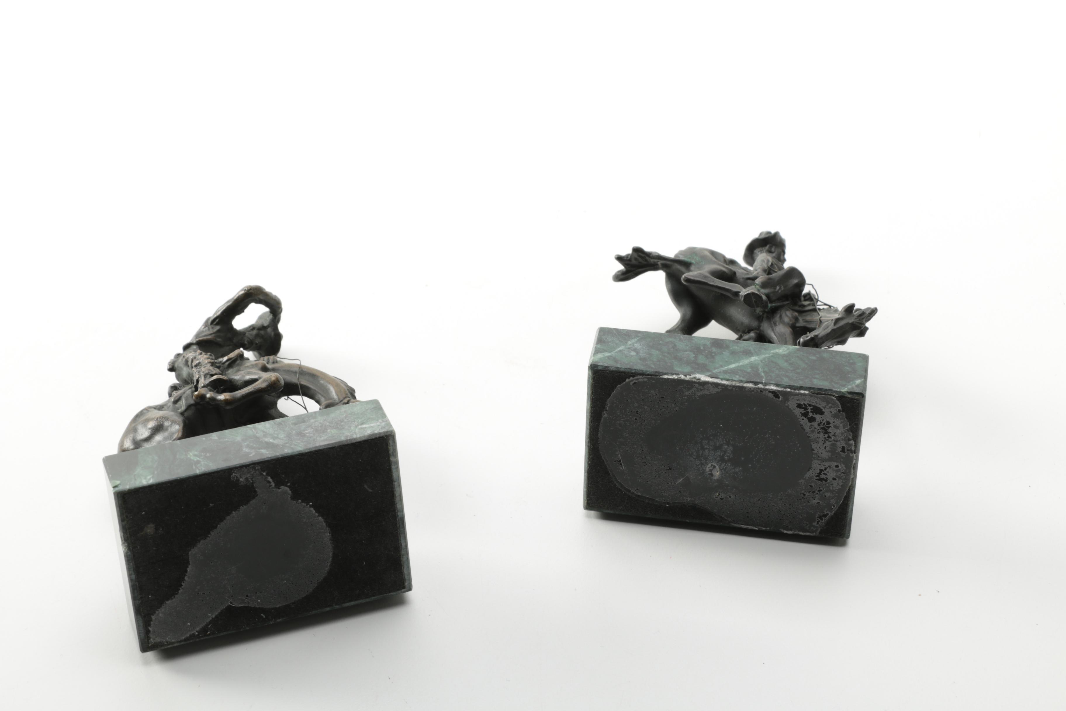 Pair of Frederic Remington Reproduction Metal Western Themed Sculptures