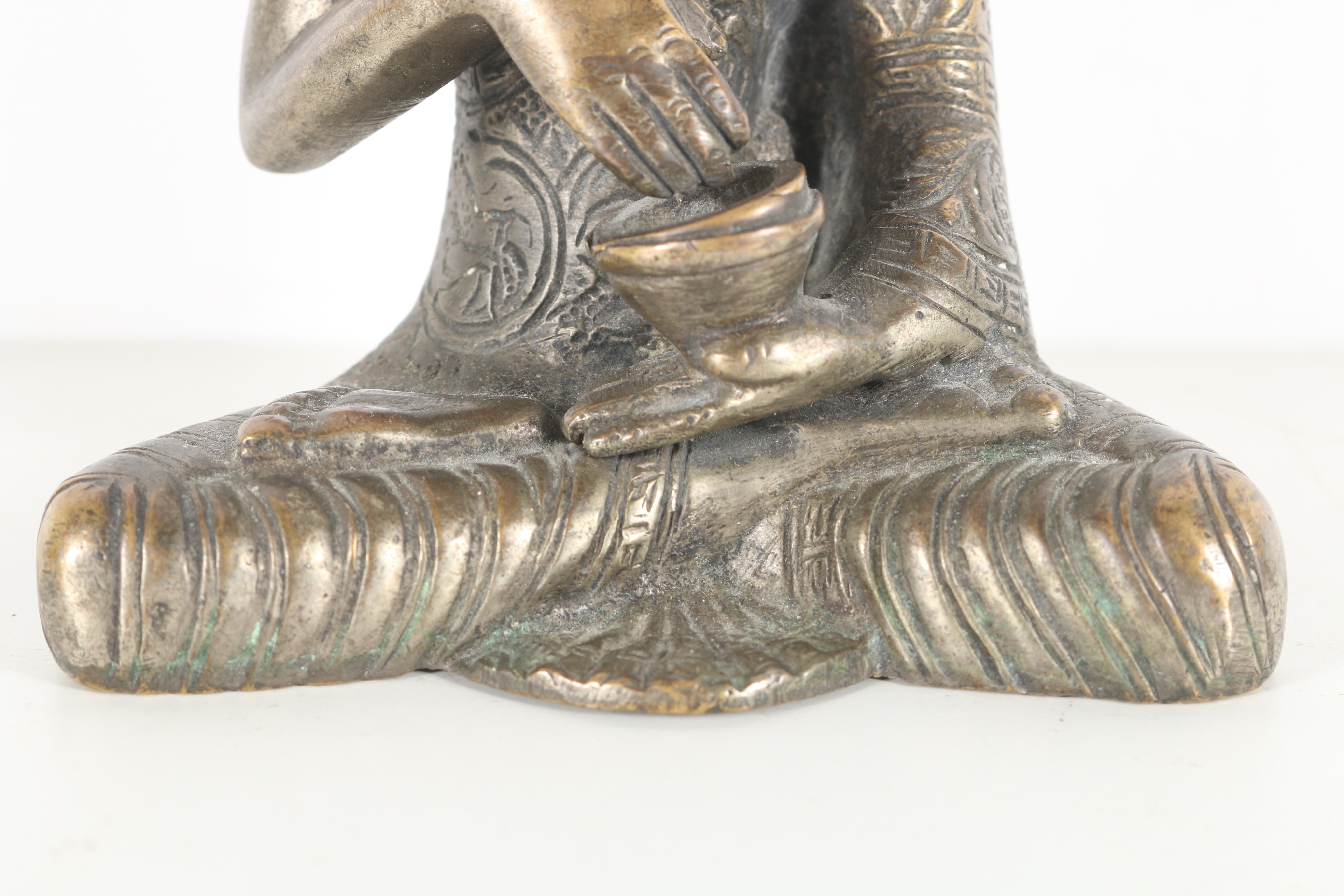 Tibetan Style Bronze-Tone Arhat Figurine