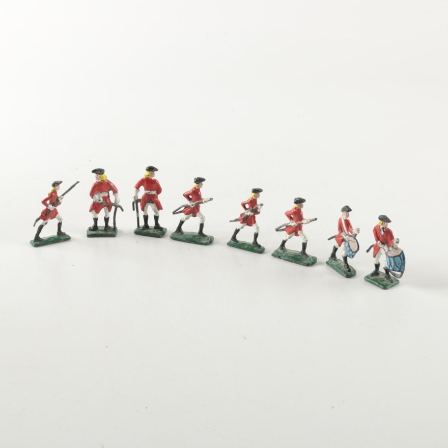 Eight Metal Toy Soldier Figurines