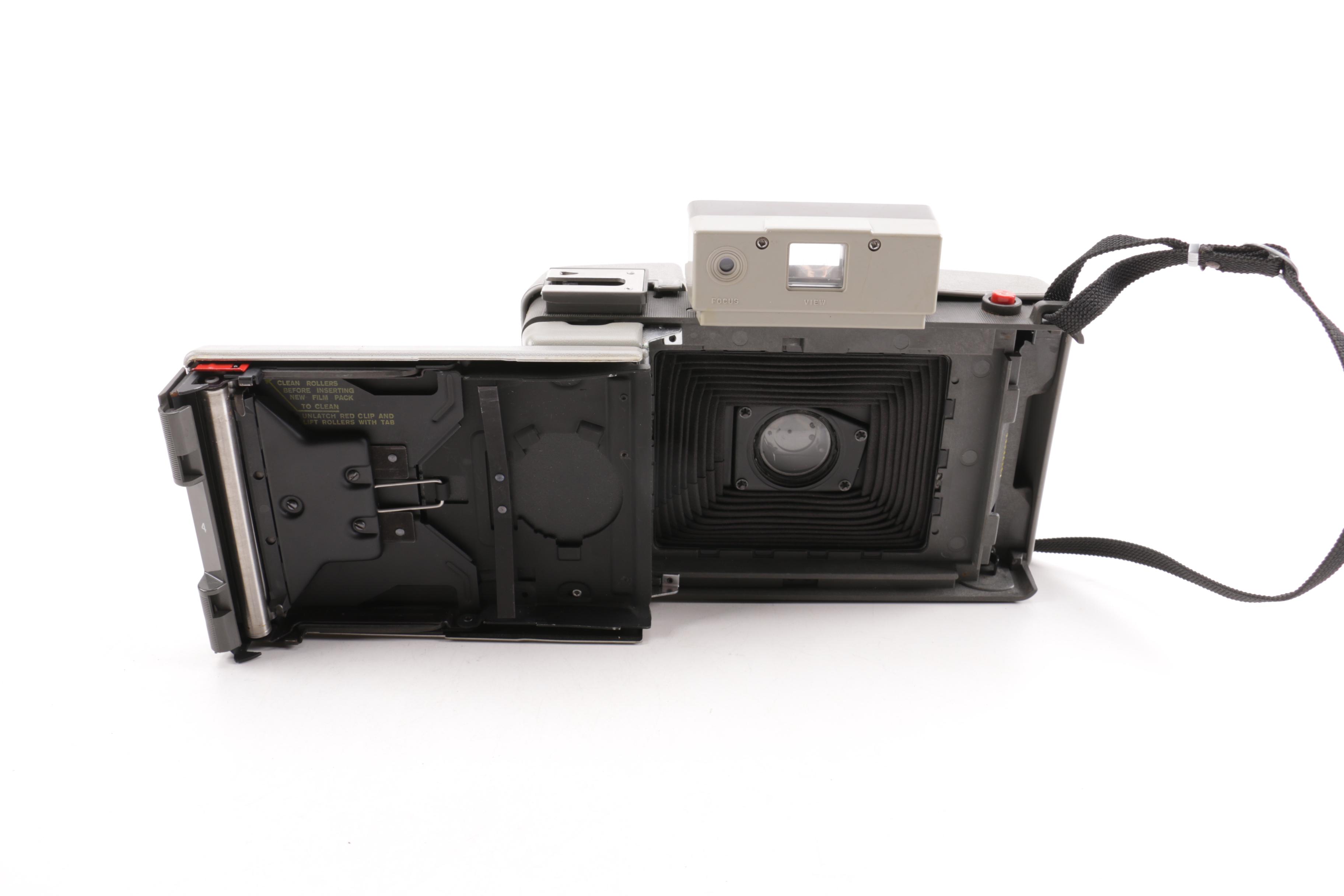 Vintage Polaroid and Beacon Cameras