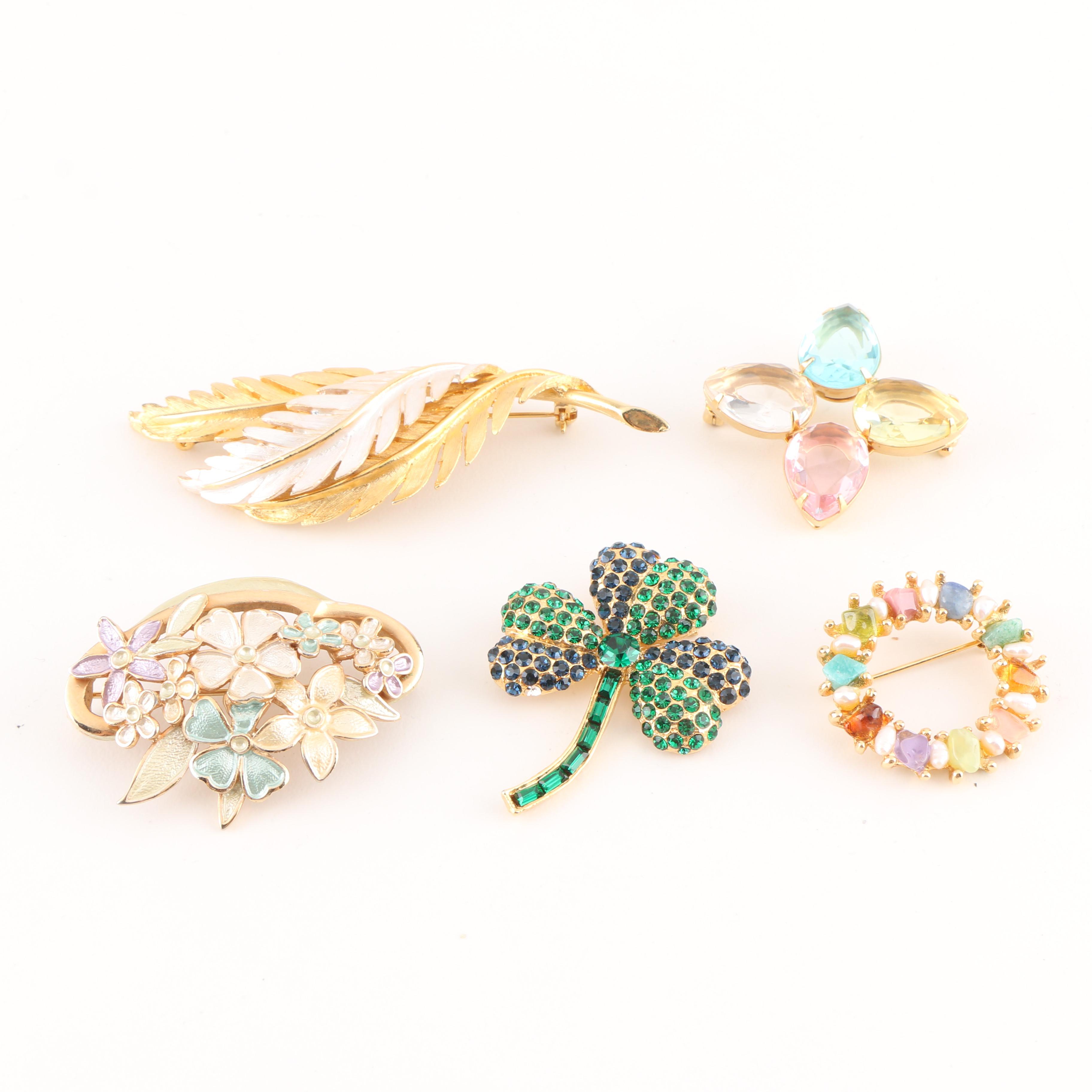 Collection of Vintage Brooches Featuring Kramer