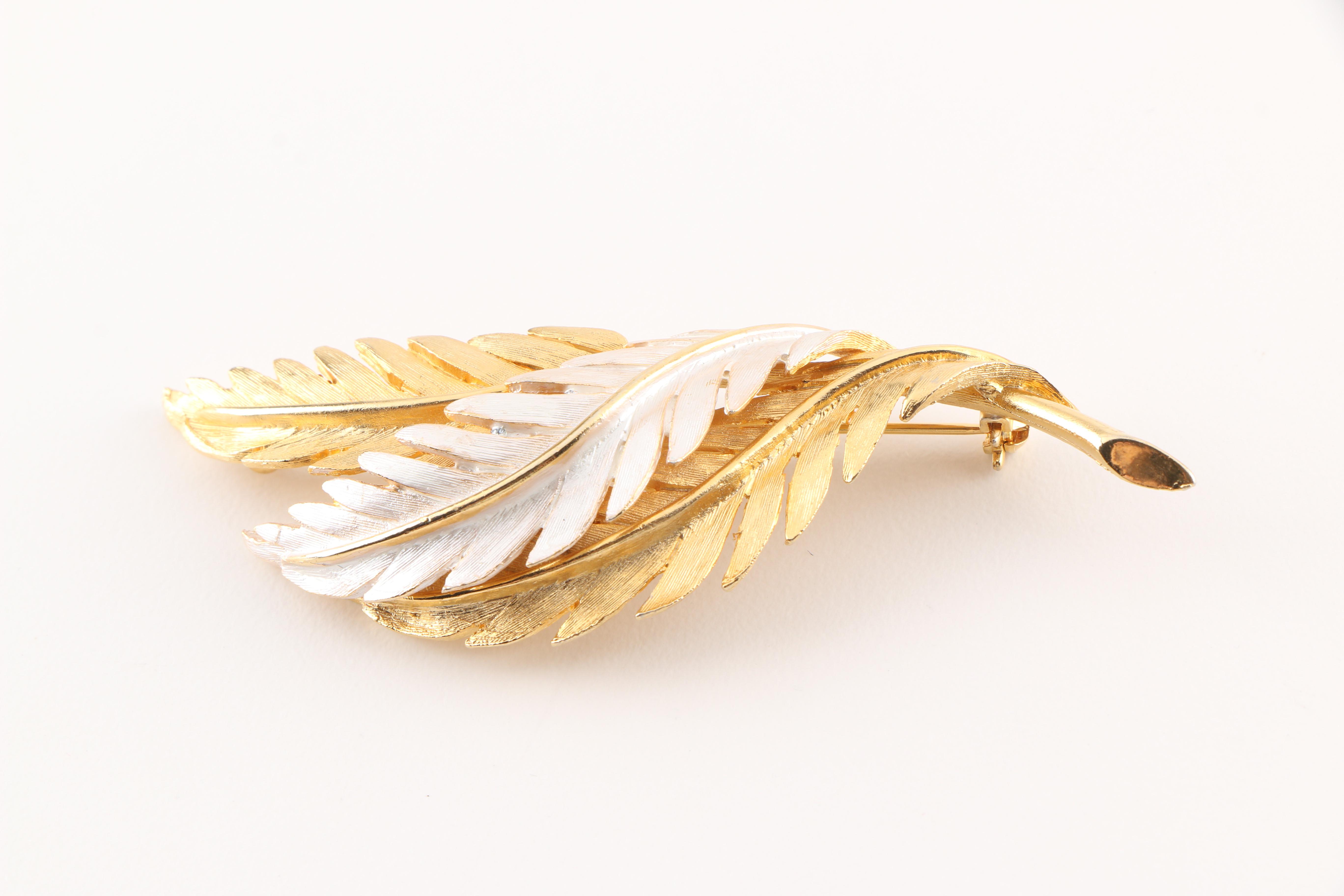 Collection of Vintage Brooches Featuring Kramer