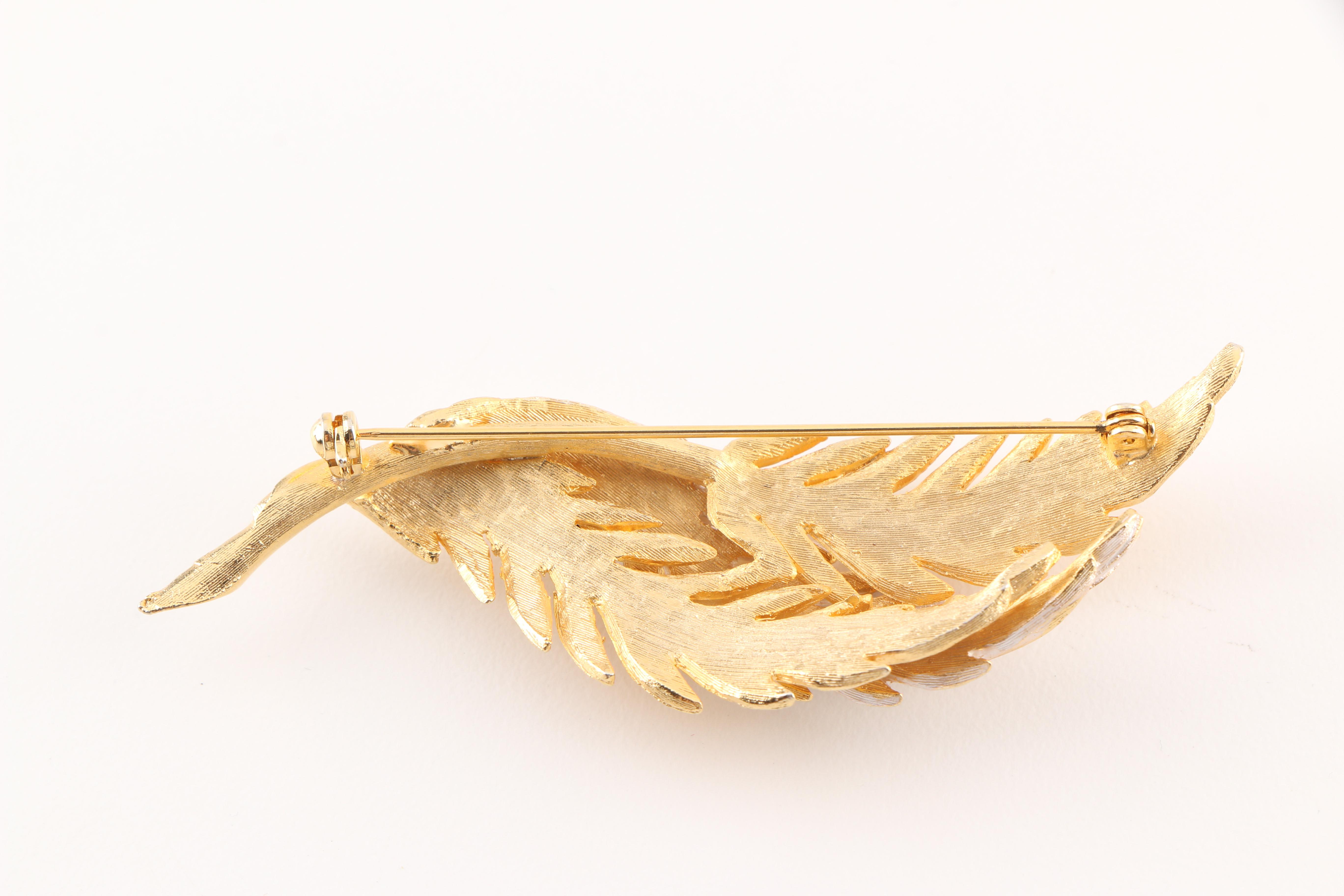 Collection of Vintage Brooches Featuring Kramer