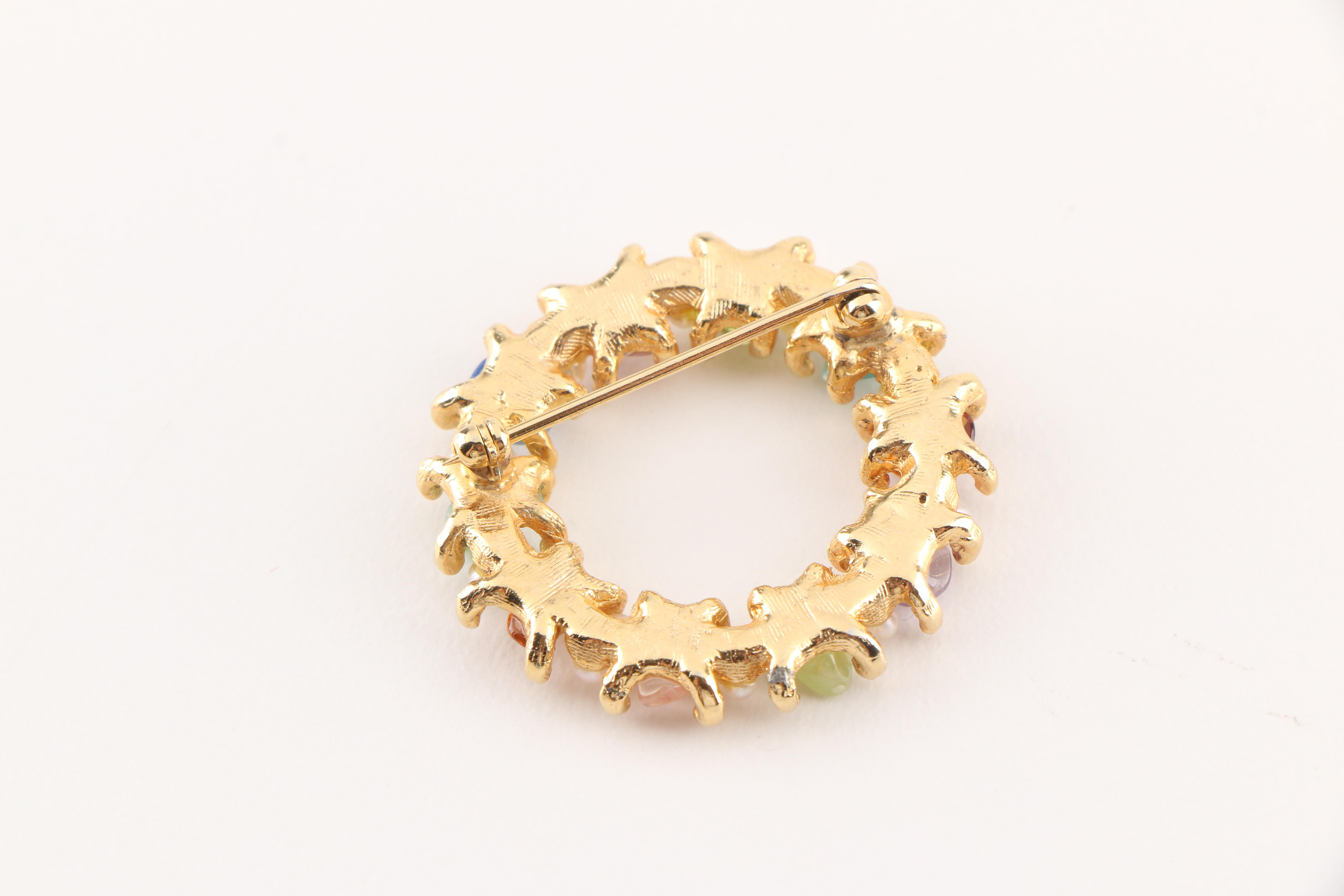 Collection of Vintage Brooches Featuring Kramer