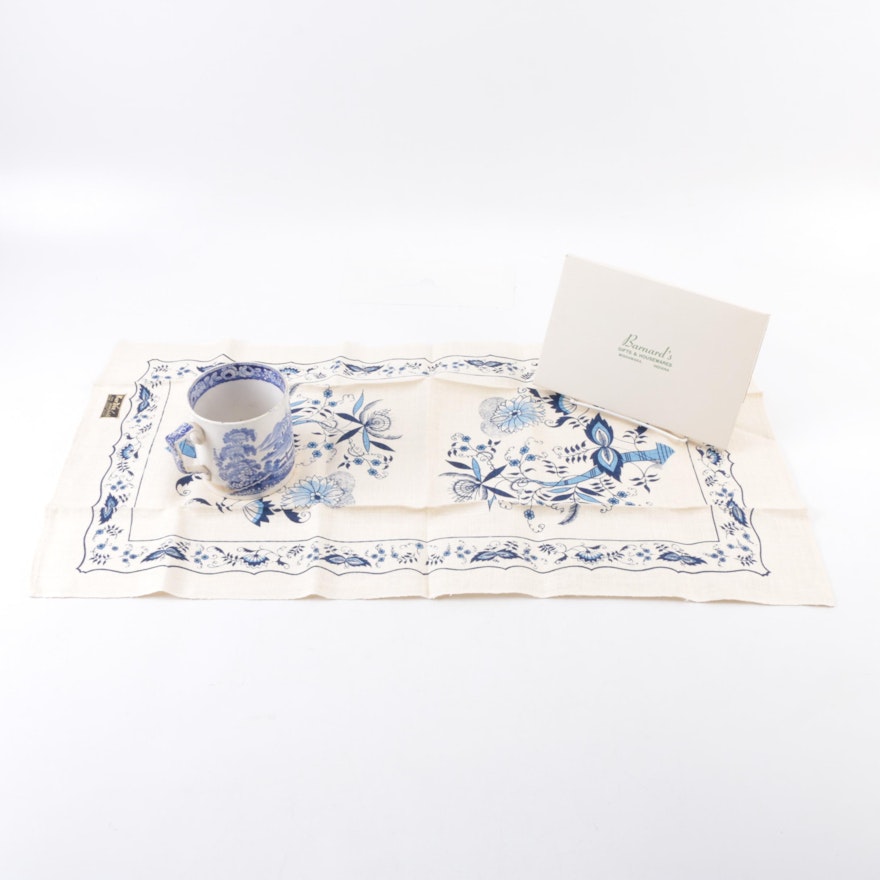 Blue and White Ceramic Mug and Linen Tablecloth