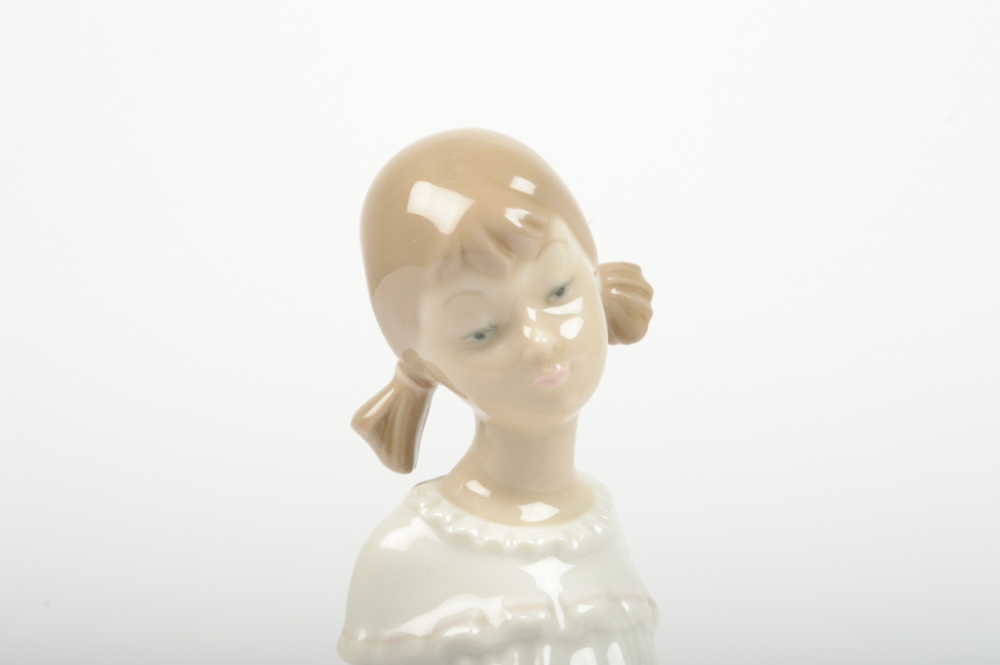 Lladró "Girl With Mother's Shoe"