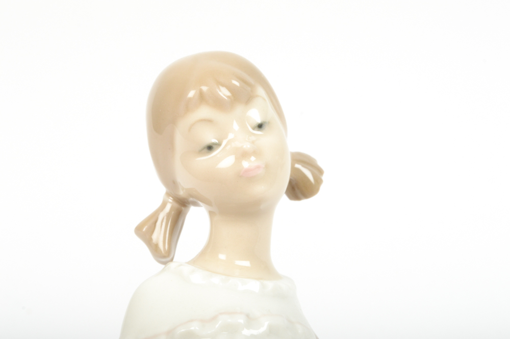 Lladró "Girl With Mother's Shoe"