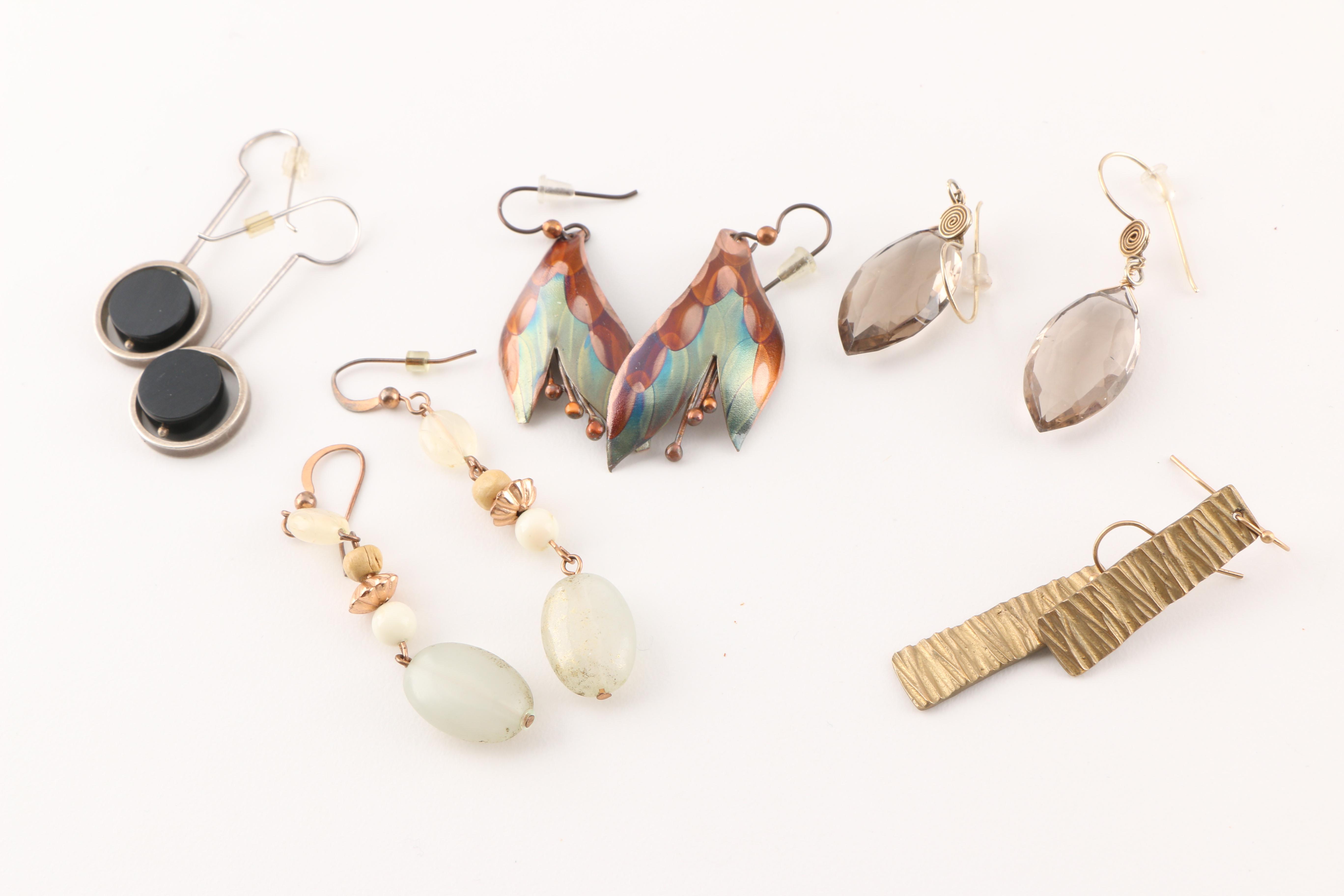 An Assortment of Costume Jewelry Featuring Franz Porcelain
