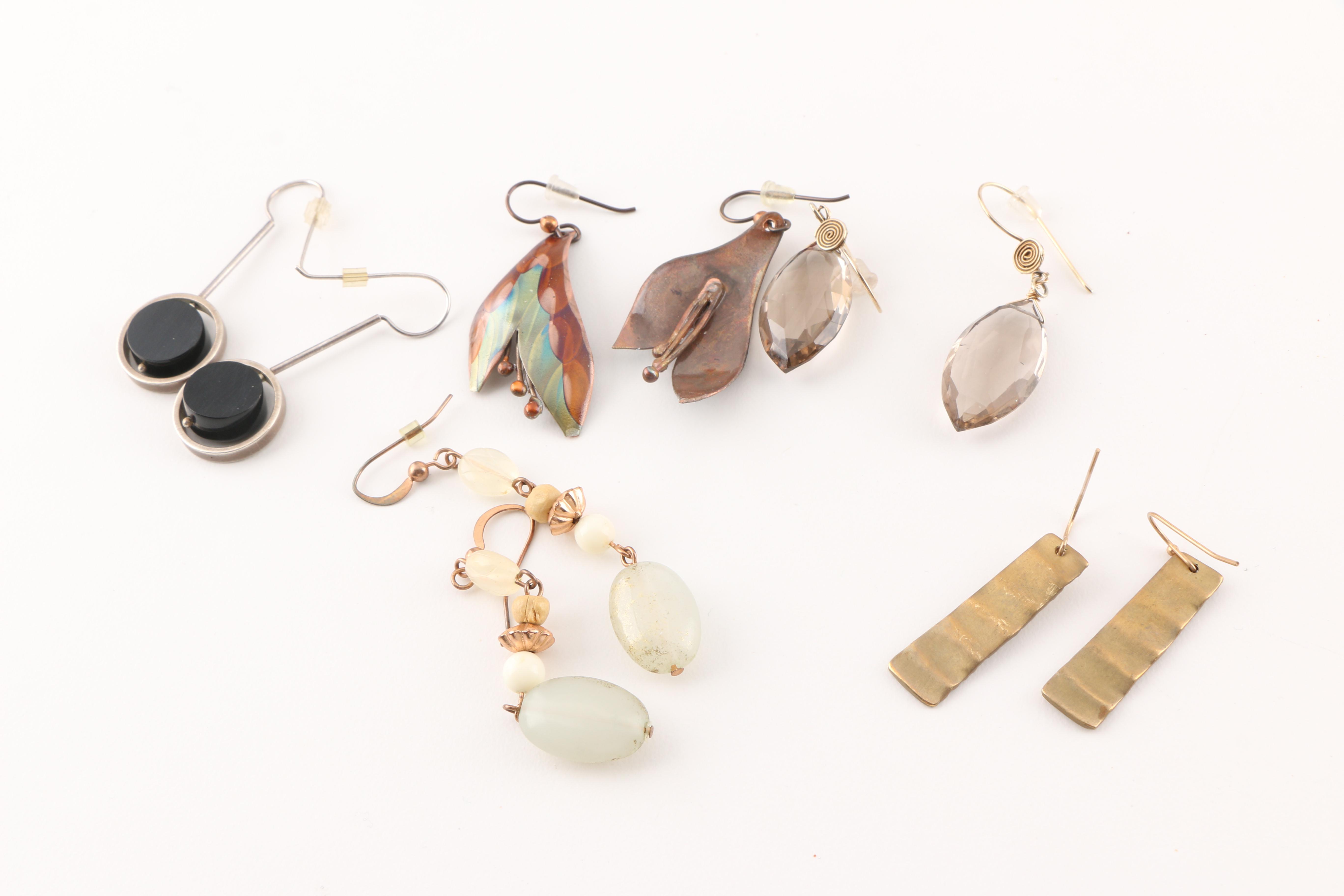 An Assortment of Costume Jewelry Featuring Franz Porcelain