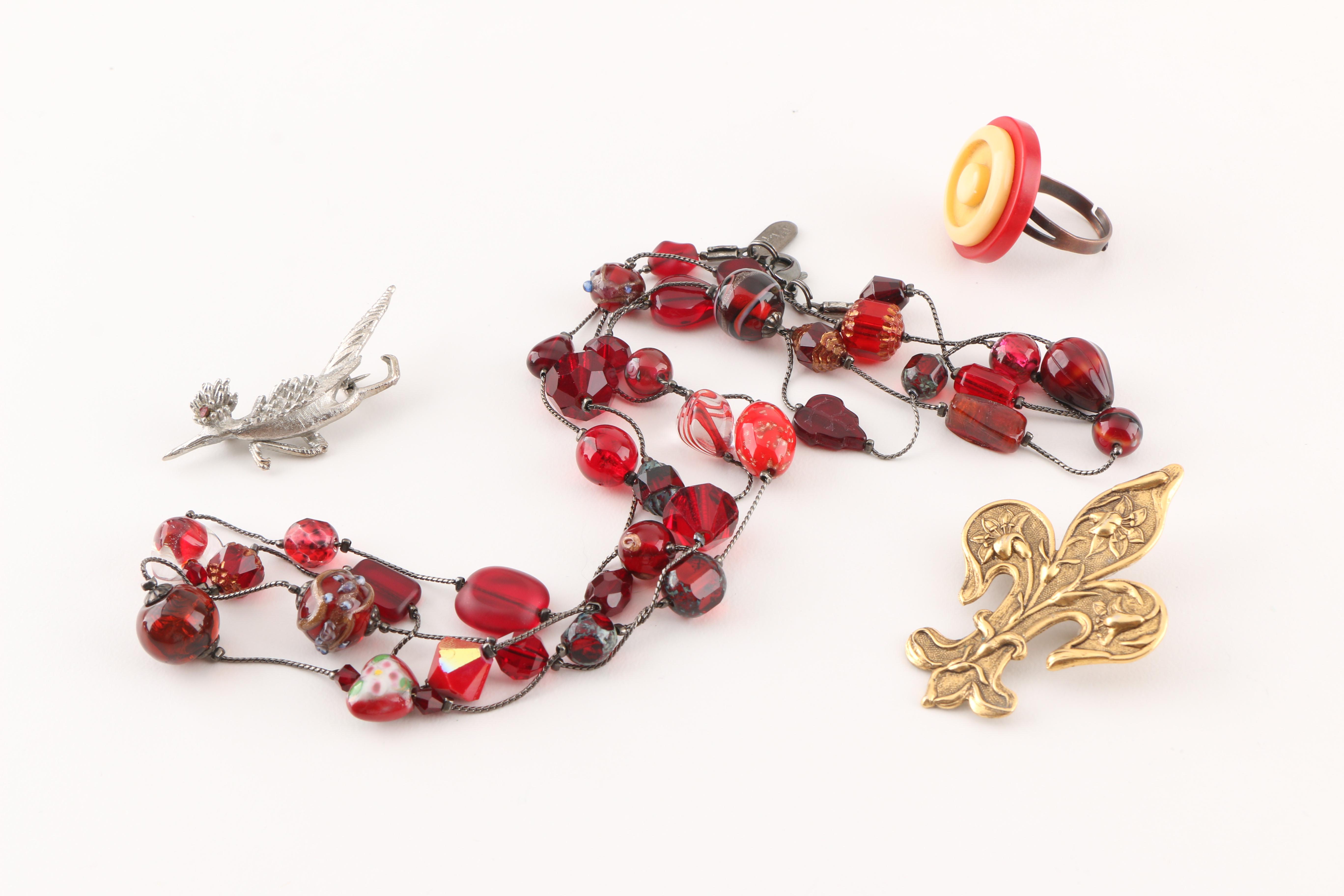 An Assortment of Costume Jewelry Featuring Franz Porcelain