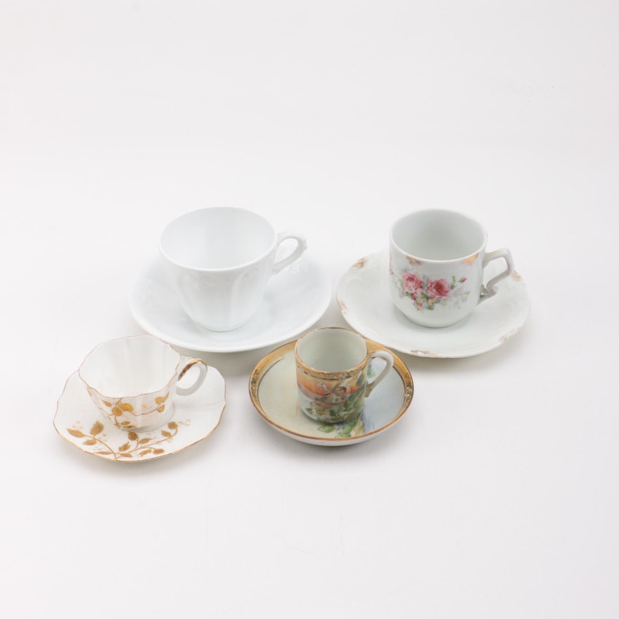 Assortment of Ceramic and Porcelain Teacups and Saucers