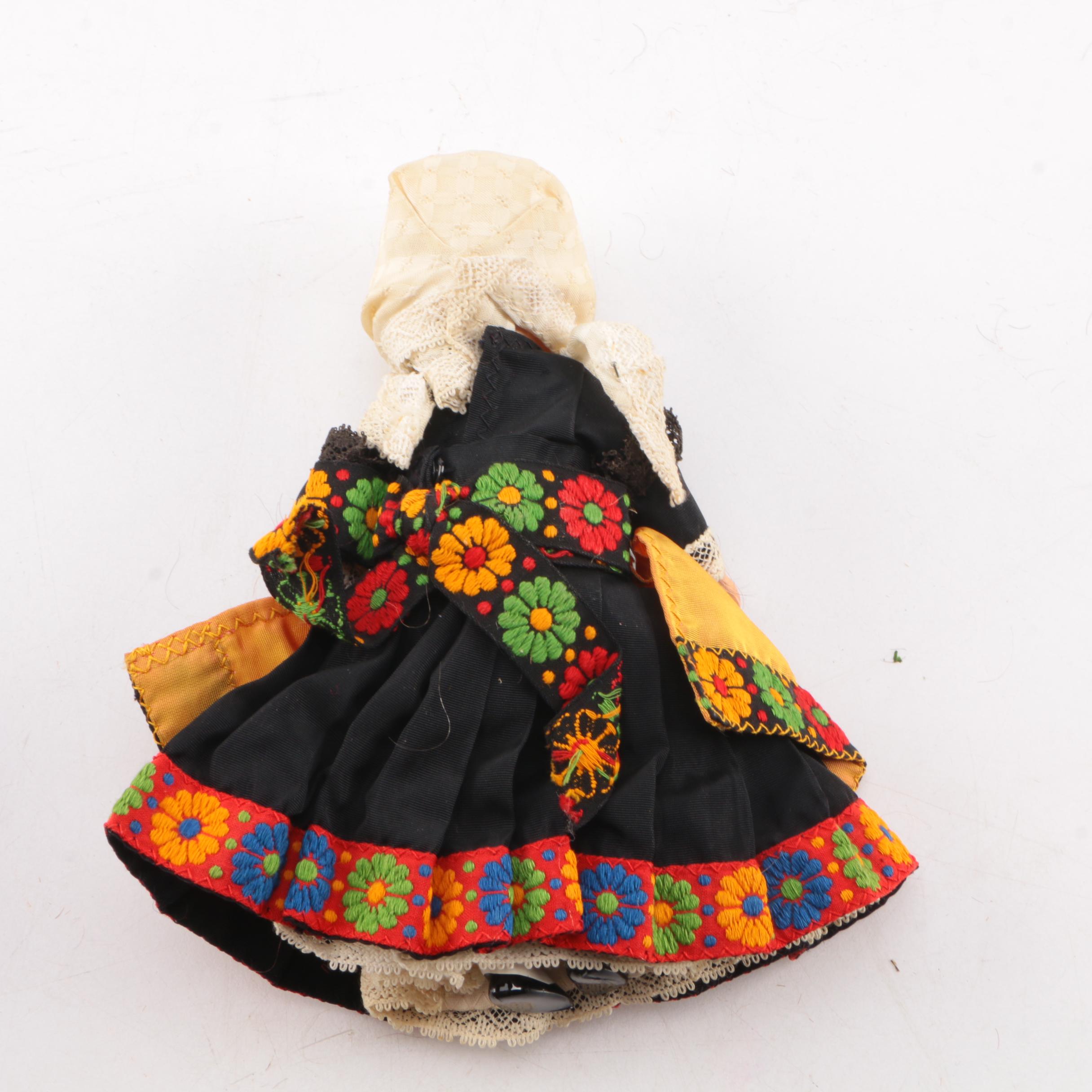 Collection of Small Dolls