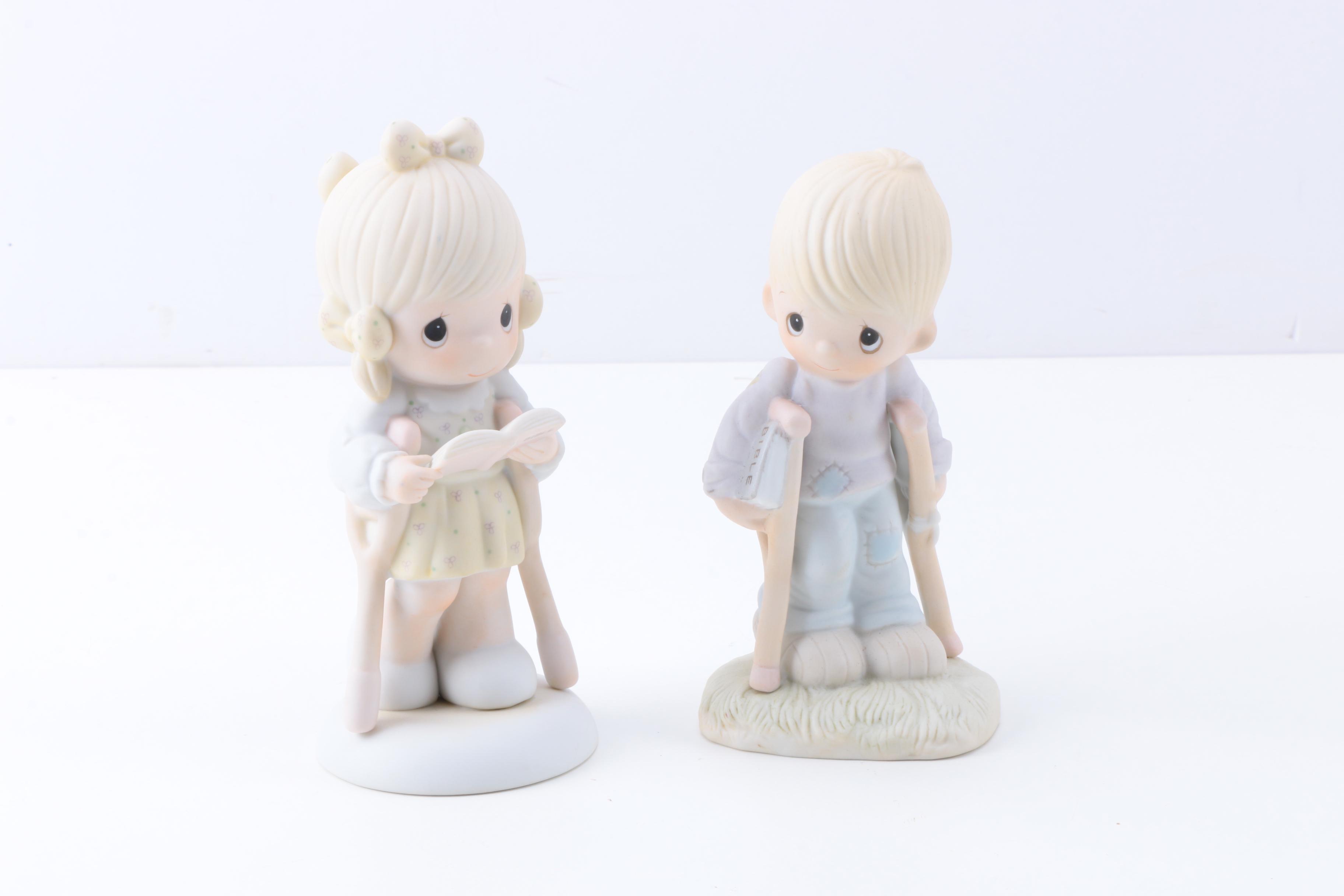 Precious Moments Figurines with "Give Ability A Chance" and Additional Figurines