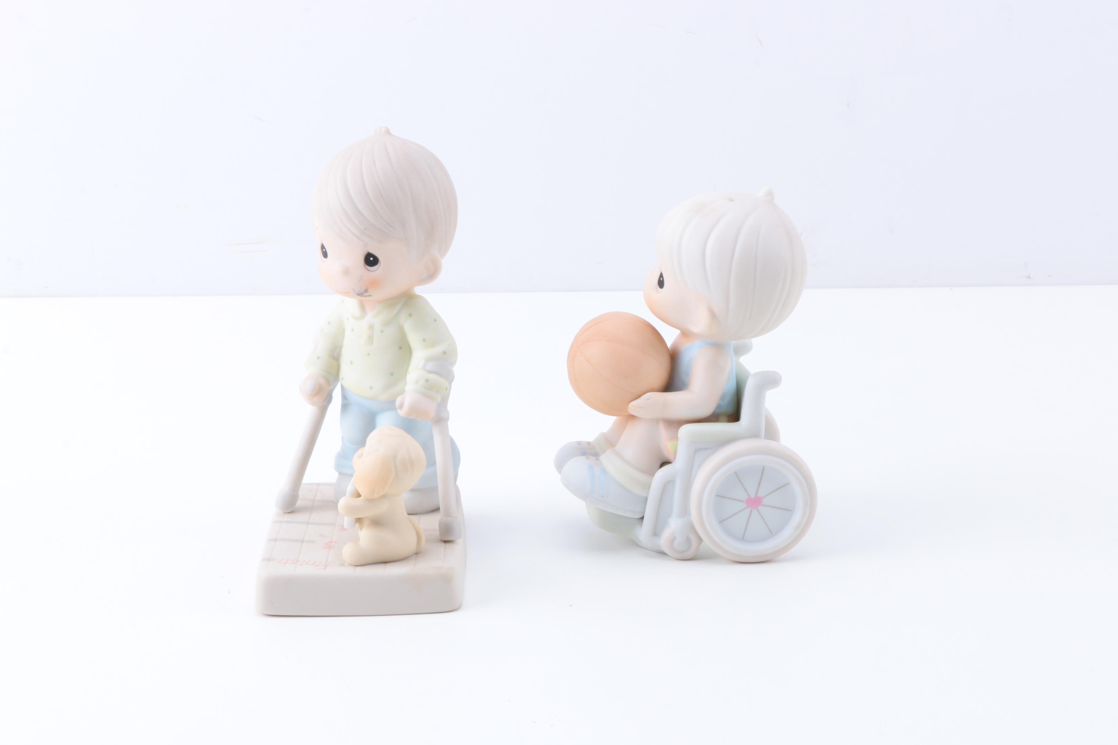 Precious Moments Figurines with "Give Ability A Chance" and Additional Figurines