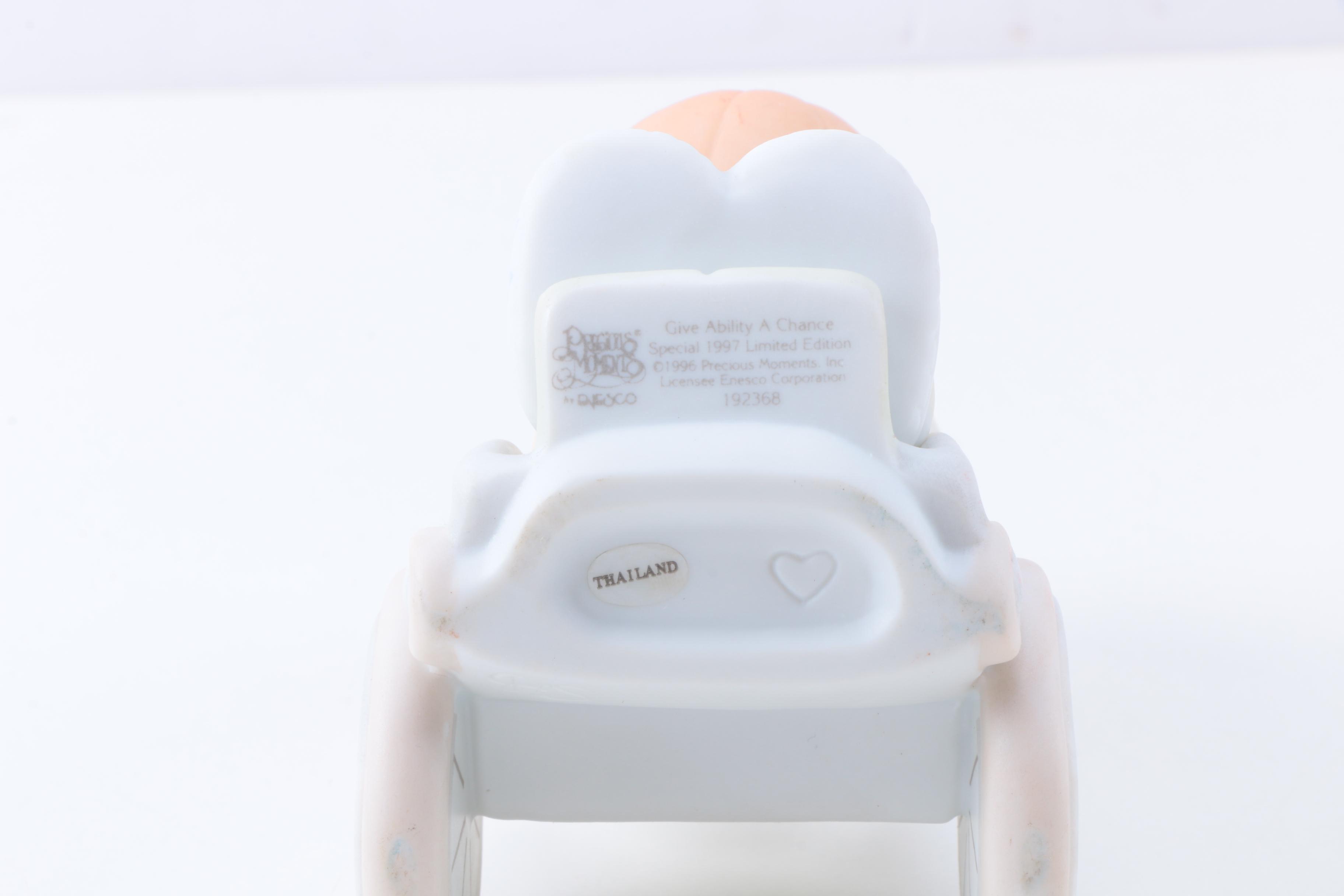 Precious Moments Figurines with "Give Ability A Chance" and Additional Figurines