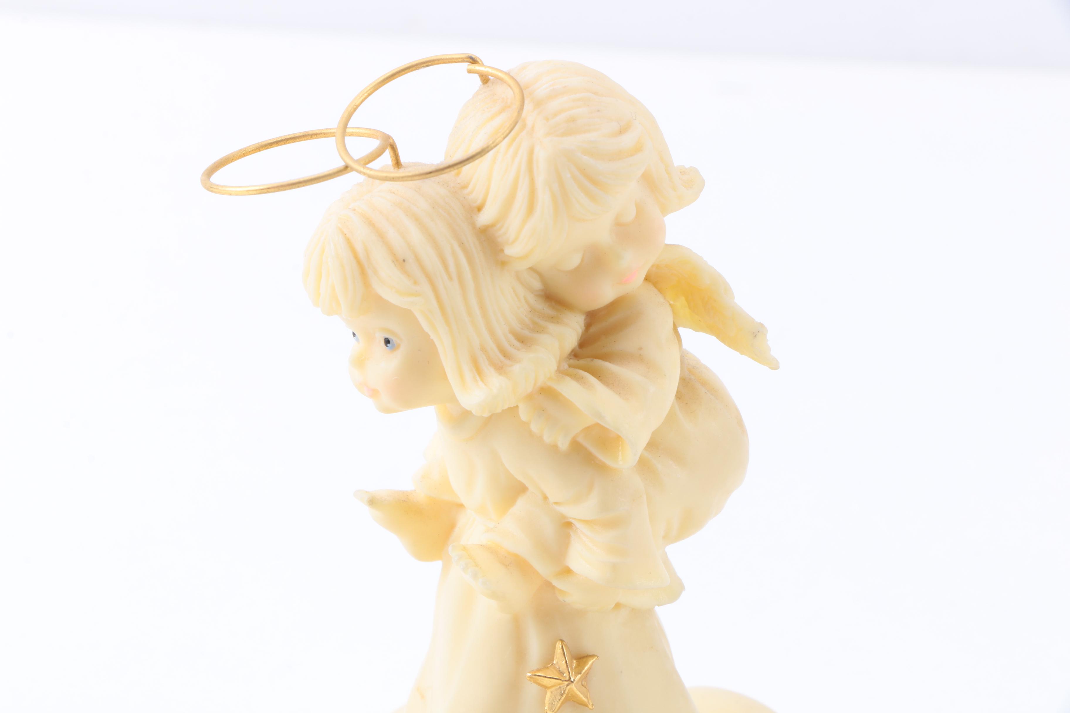 Precious Moments Figurines with "Give Ability A Chance" and Additional Figurines