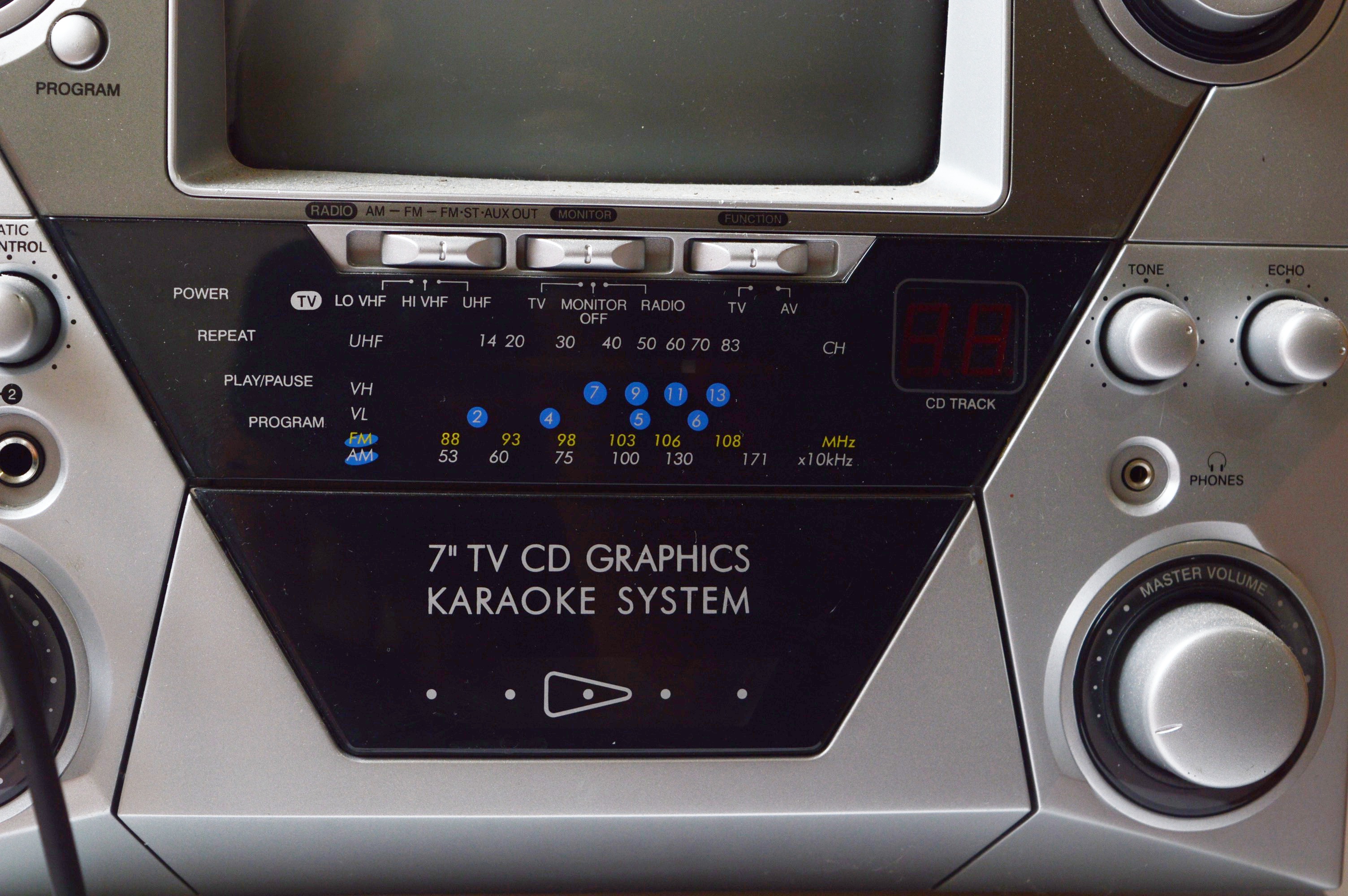 Memorex Karaoke Machine with CDs, and Hitachi Boombox