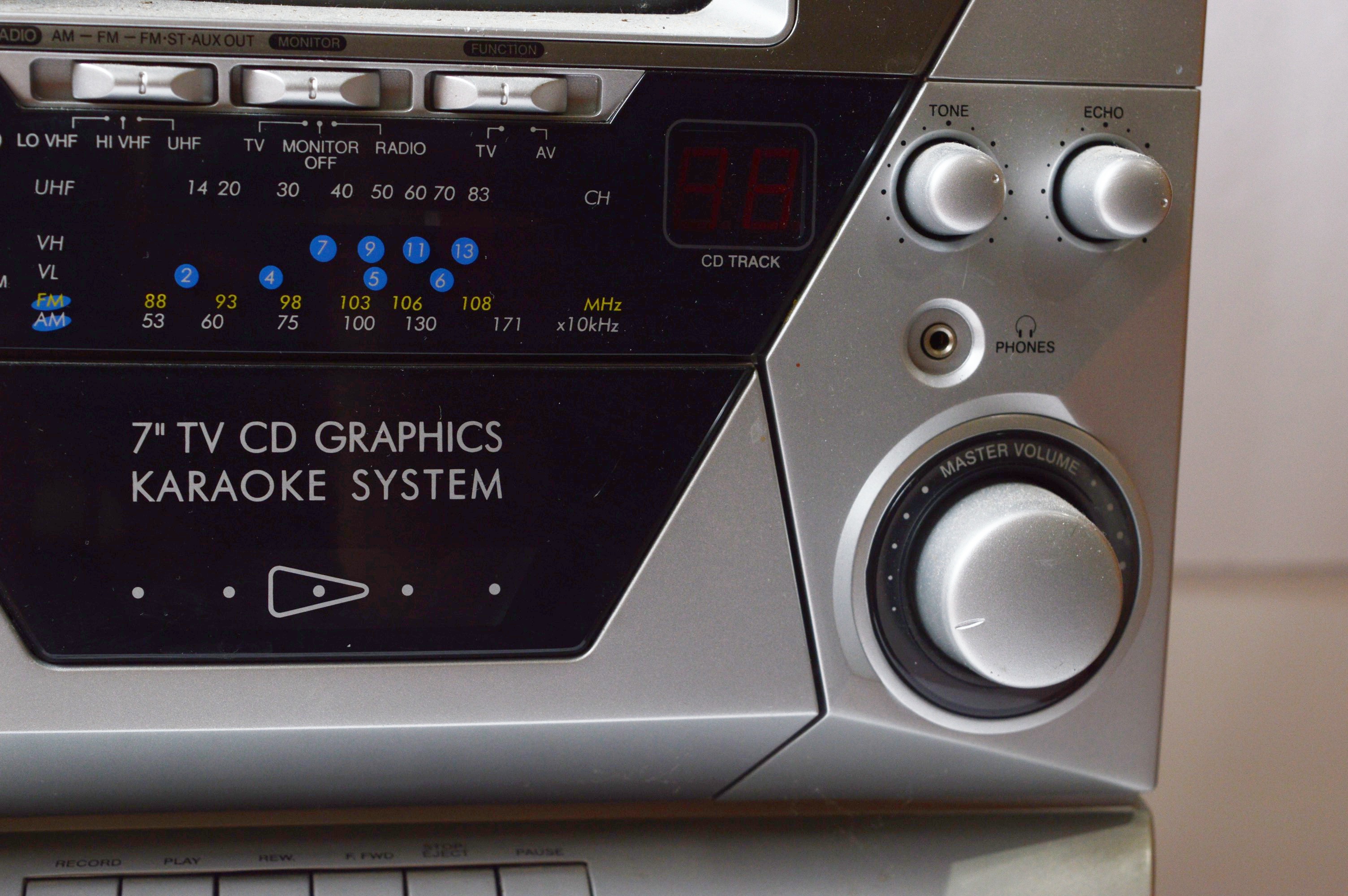 Memorex Karaoke Machine with CDs, and Hitachi Boombox