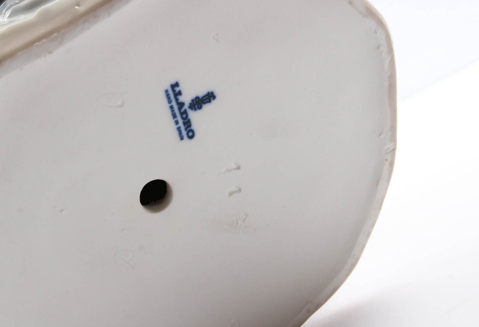 Lladró Girl with Doll Figurine